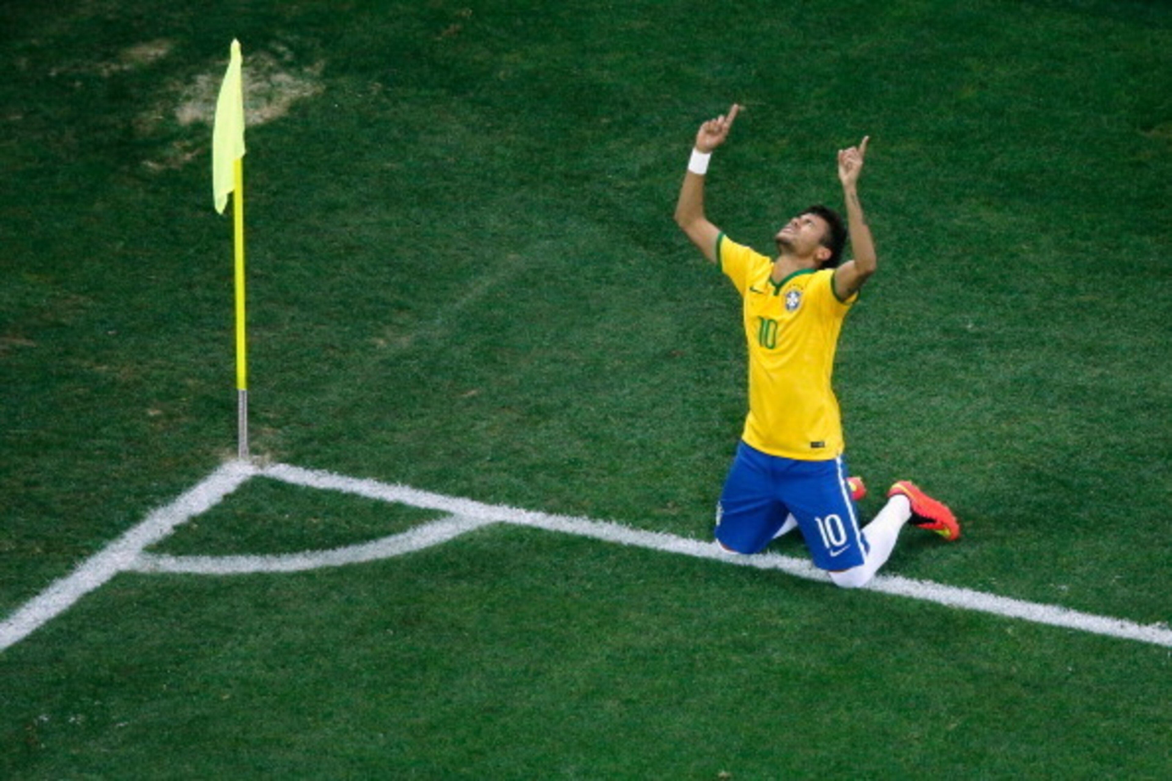SAO PAULO, BRAZIL - JUNE 12:  Neymar of Brazil celebrates scoring his second goal on a penalty kick in the second half during the 2014 FIFA World Cup Brazil Group A match between Brazil and Croatia at Arena de Sao Paulo on June 12, 2014 in Sao Paulo, Braz