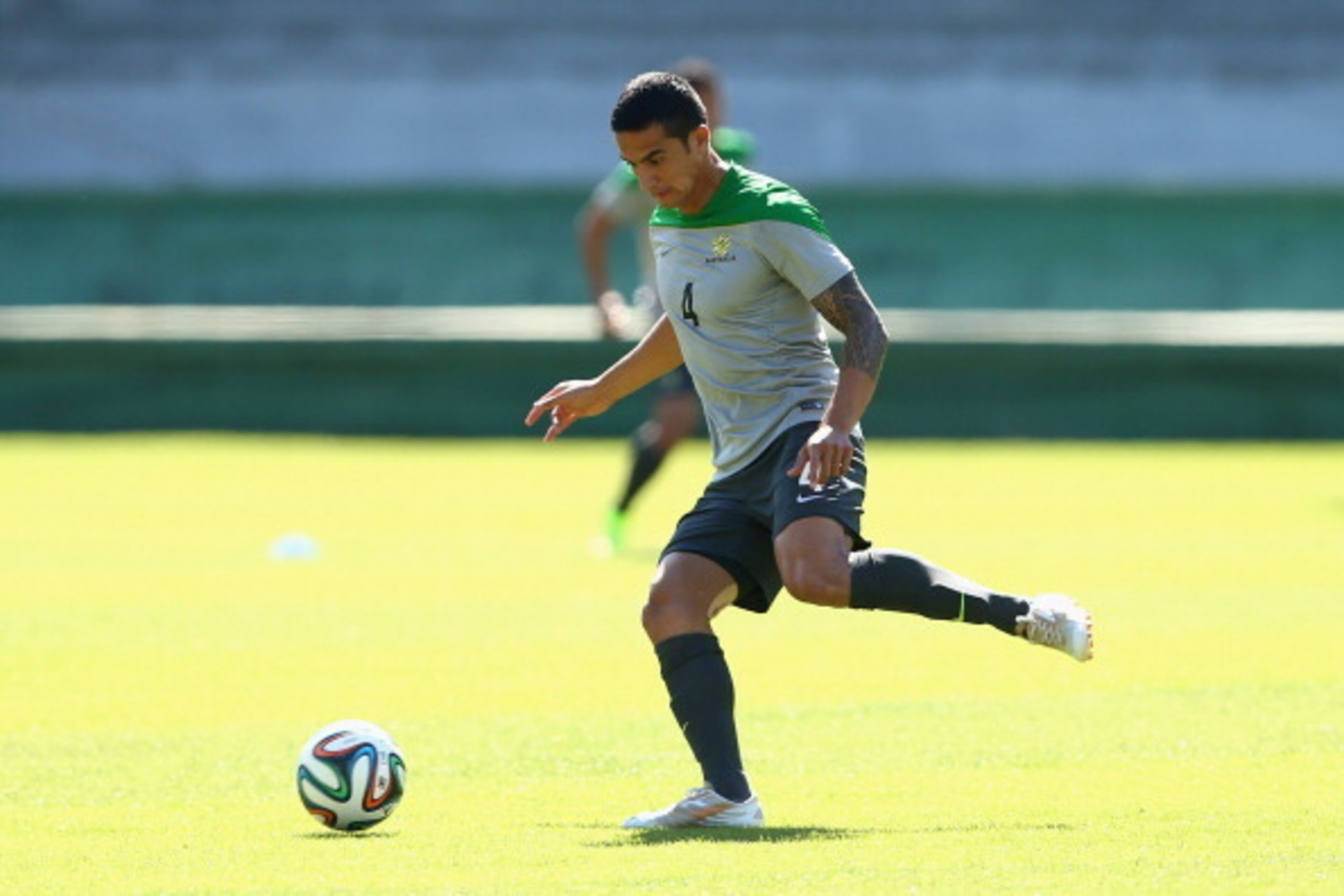 CURITIBA, BRAZIL - JUNE 22: Tim Cahill of the Socceroos kicks during an Australian Socceroos training session and press conference at Estadio Couto Pereira on June 22, 2014 in Curitiba, Brazil.  (Photo by Cameron Spencer/Getty Images)