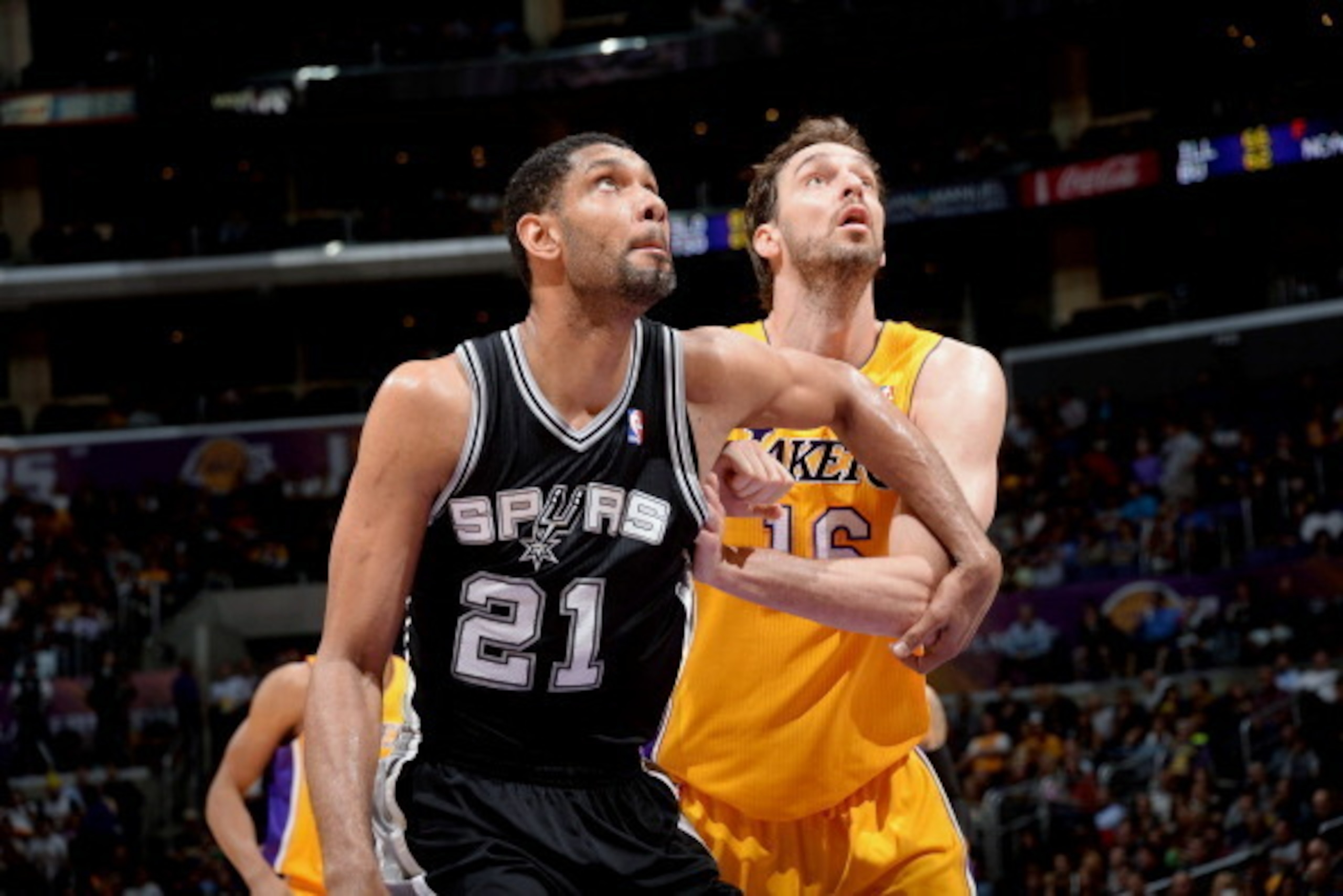 LOS ANGELES, CA - MARCH 19: Tim Duncan #21 of the San Antonio Spurs battles for position against Pau Gasol #16 of the Los Angeles Lakers at Staples Center on March 19, 2014 in Los Angeles, California. NOTE TO USER: User expressly acknowledges and agrees t LOS ANGELES, CA - MARCH 19: Tim Duncan #21 of the San Antonio Spurs battles for position against Pau Gasol #16 of the Los Angeles Lakers at Staples Center on March 19, 2014 in Los Angeles, California. NOTE TO USER: User expressly acknowledges and agrees t