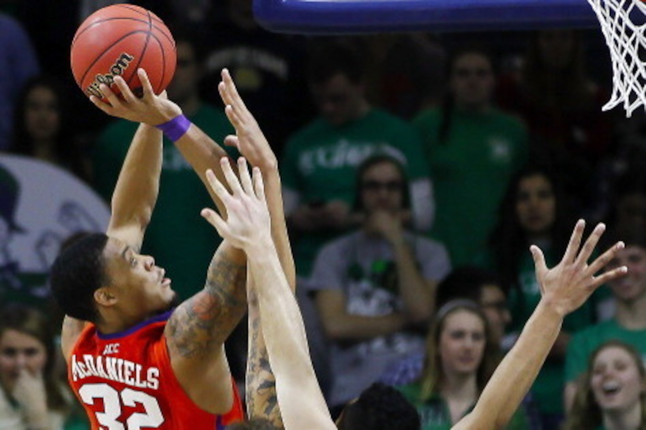 SOUTH BEND, IN - FEBRUARY 11: K.J. McDaniels #32 of the Clemson Tigers shoots the ball against the Notre Dame Fighting Irish at Purcel Pavilion on February 11, 2014 in South Bend, Indiana. Notre Dame defeated Clemson 68-64 in 2OT. (Photo by Michael Hickey