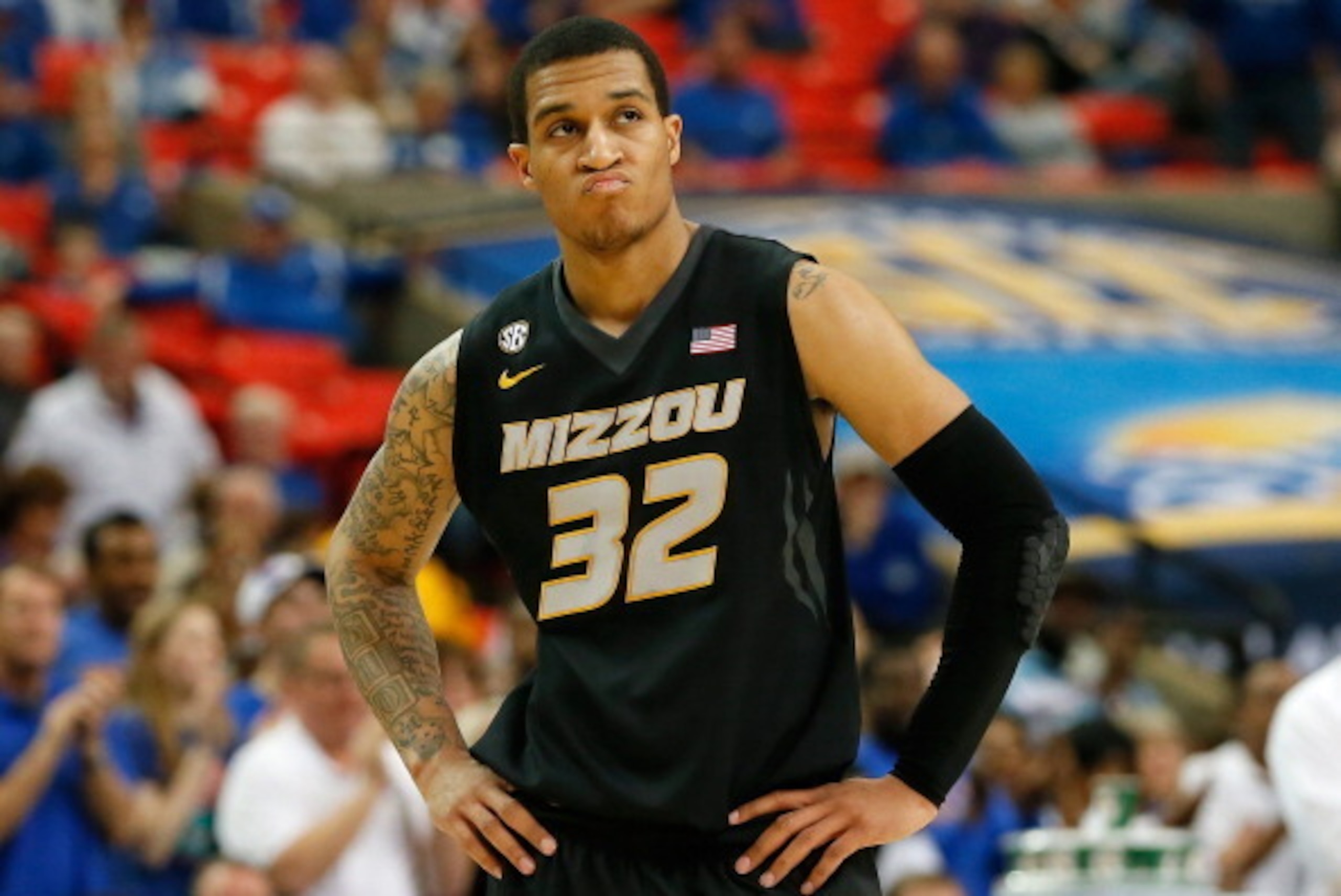 ATLANTA, GA - MARCH 14:  Jabari Brown #32 of the Missouri Tigers reacts in the final minutes of their 72-49 loss to the Florida Gators during the quarterfinals of the SEC Men's Basketball Tournament at Georgia Dome on March 14, 2014 in Atlanta, Georgia.  