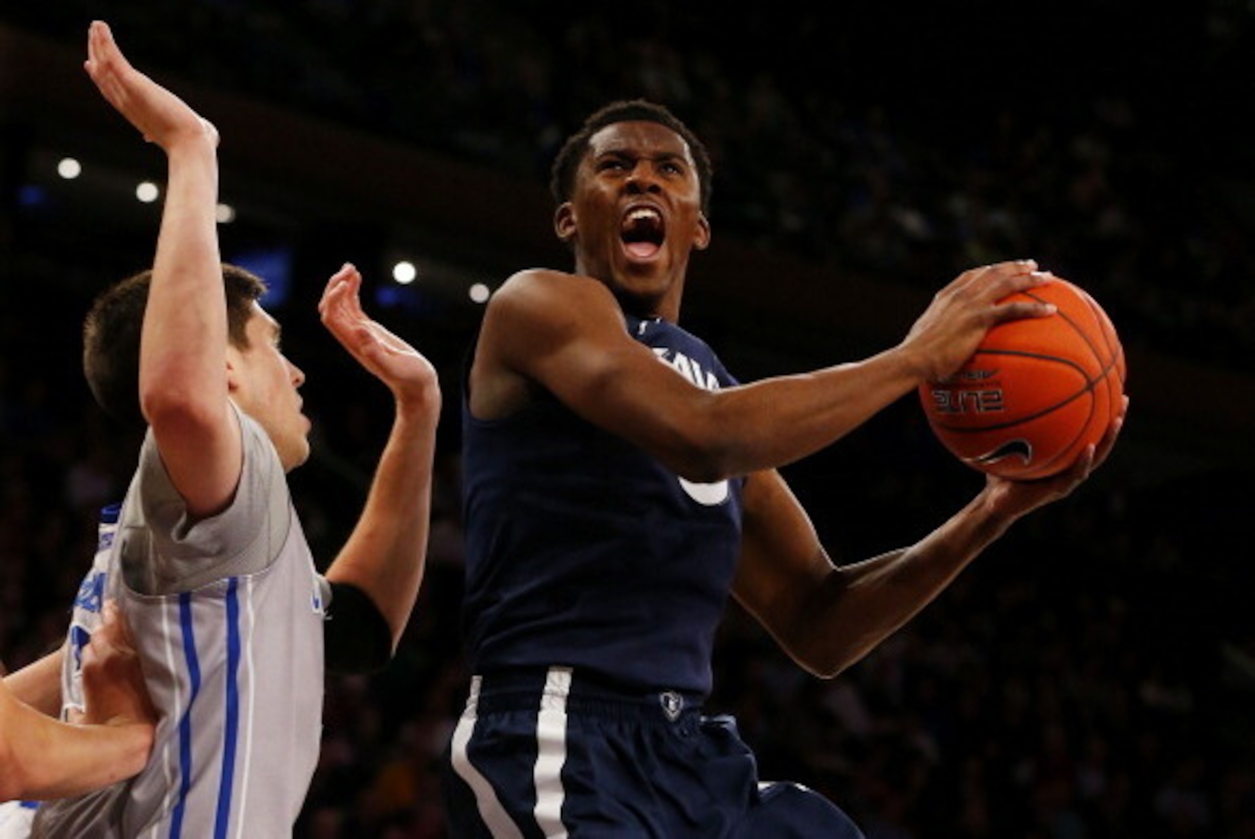 NEW YORK, NY - MARCH 14:  Semaj Christon #0 of the Xavier Musketeers shoots against Doug McDermott #3 of the Creighton Bluejays in the first half during the Semifinals of the 2014 Men's Big East Basketball Tournament at Madison Square Garden on March 14, 