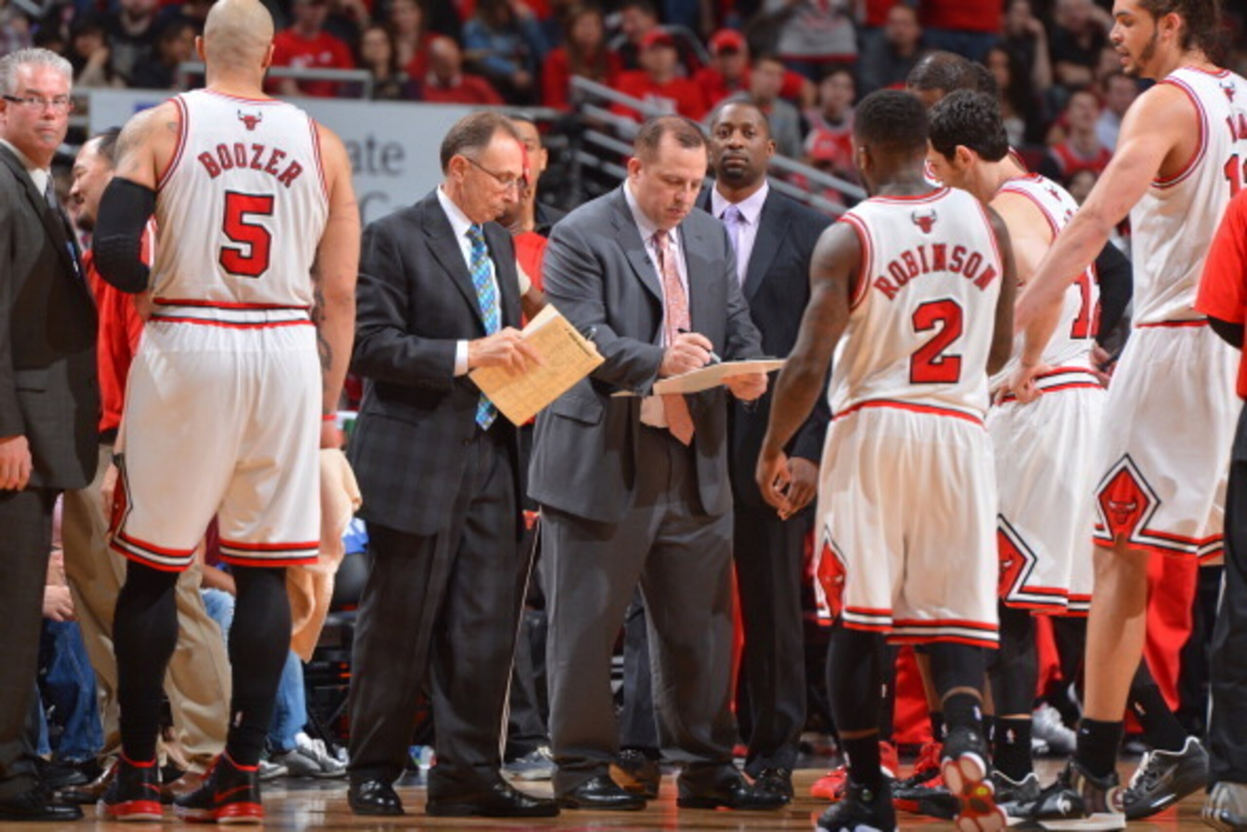 CHICAGO, IL - APRIL 27: Chicago Bulls Head Coach Tom Thibodeau (right) and Assistant Coach Ron Adams draw up a play during a timeout in the second overtime period in Game Four of the Eastern Conference Quarterfinals against the Brooklyn Nets during the 20