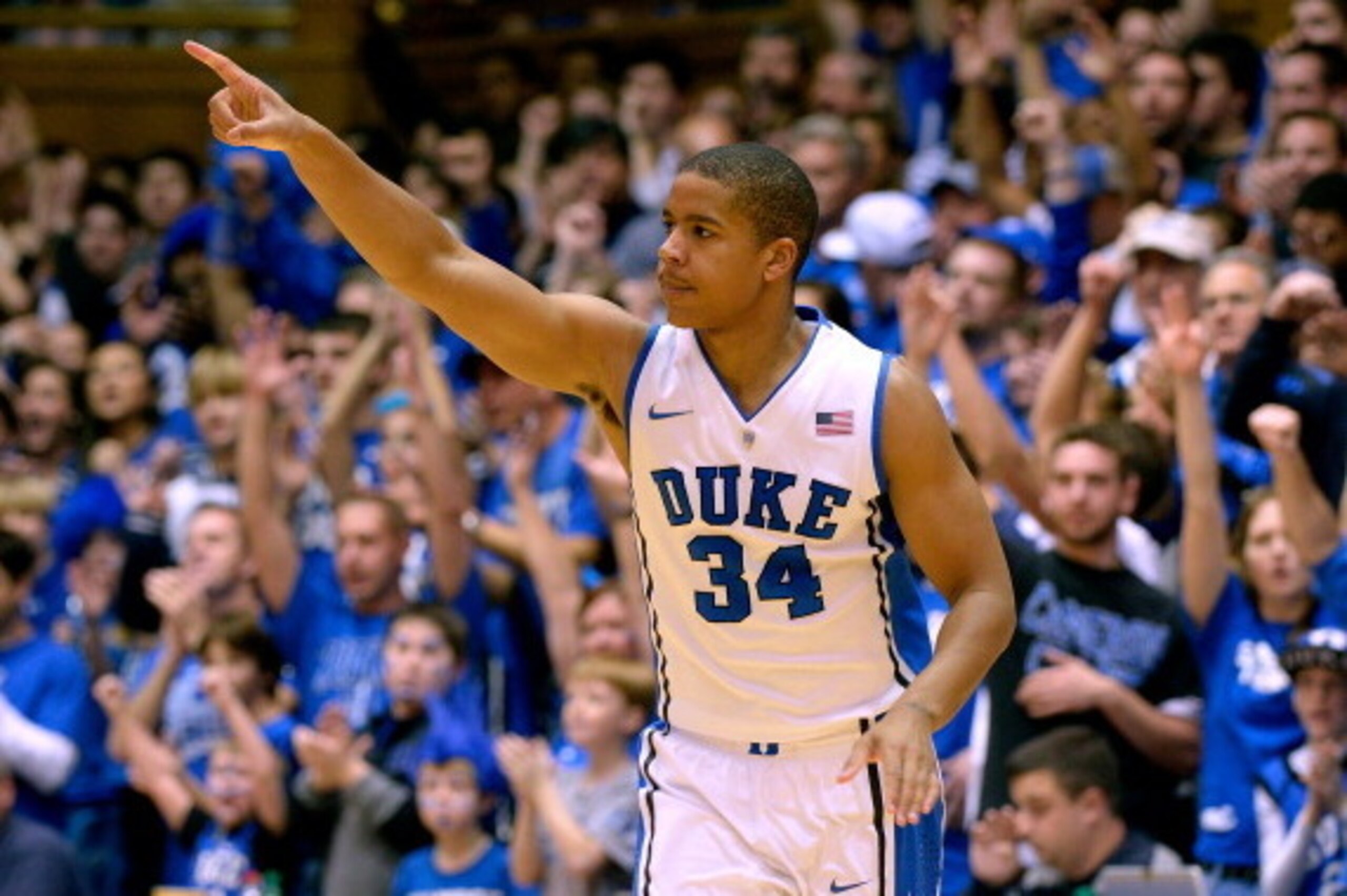 DURHAM, NC - DECEMBER 28:  Andre Dawkins #34 of the Duke Blue Devils reacts after making a three-point basket against the Eastern Michigan Eagles during their game at Cameron Indoor Stadium on December 28, 2013 in Durham, North Carolina. Duke won 82-59.  