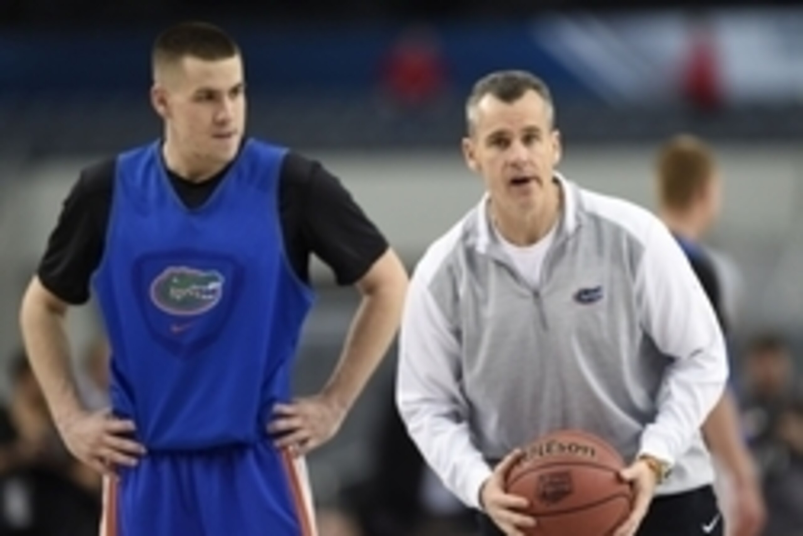 Apr 4, 2014; Arlington, TX, USA; Florida Gators head coach Billy Donovan and son guard Billy Donovan (left) during practice before the semifinals of the Final Four in the 2014 NCAA Mens Division I Championship tournament at AT&T Stadium. Mandatory Credit:
