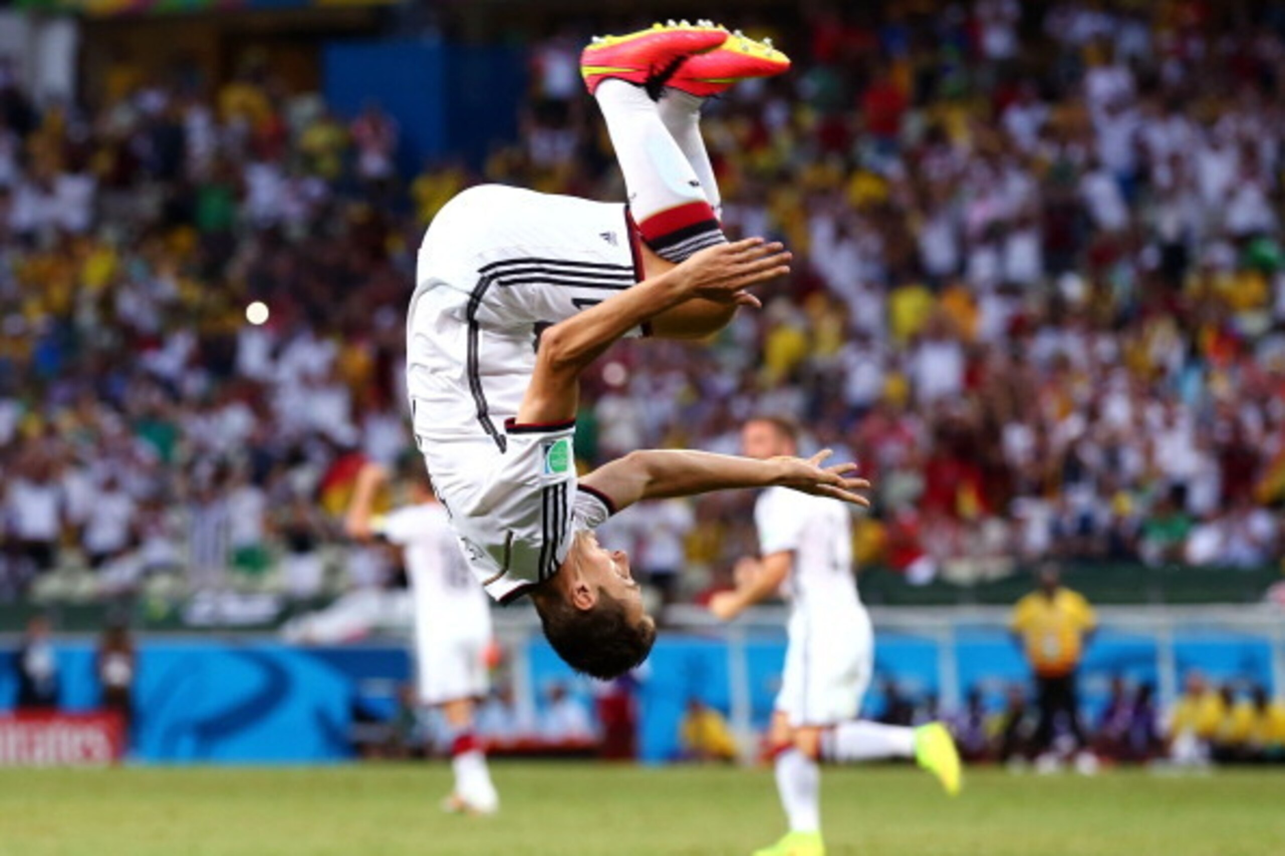 FORTALEZA, BRAZIL - JUNE 21: Miroslav Klose of Germany does a flip in celebration of scoring his team's second goal during the 2014 FIFA World Cup Brazil Group G match between Germany and Ghana at Castelao on June 21, 2014 in Fortaleza, Brazil.  (Photo by