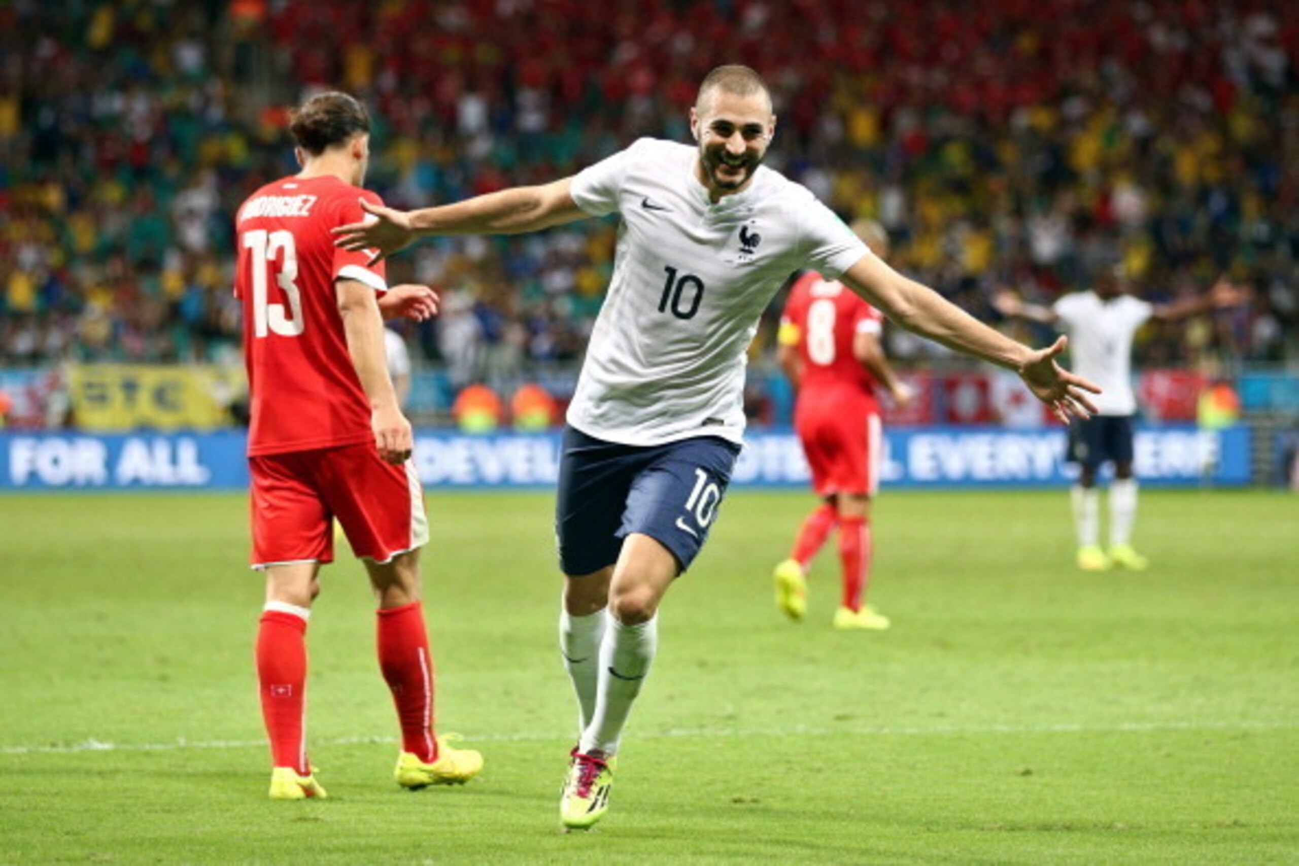 SALVADOR, BRAZIL - JUNE 20: Karim Benzema of France celebrates a goal that came after the referee had blown full time during the 2014 FIFA World Cup Brazil Group E match between Switzerland and France at Arena Fonte Nova on June 20, 2014 in Salvador, Bra SALVADOR, BRAZIL - JUNE 20: Karim Benzema of France celebrates a goal that came after the referee had blown full time during the 2014 FIFA World Cup Brazil Group E match between Switzerland and France at Arena Fonte Nova on June 20, 2014 in Salvador, Bra