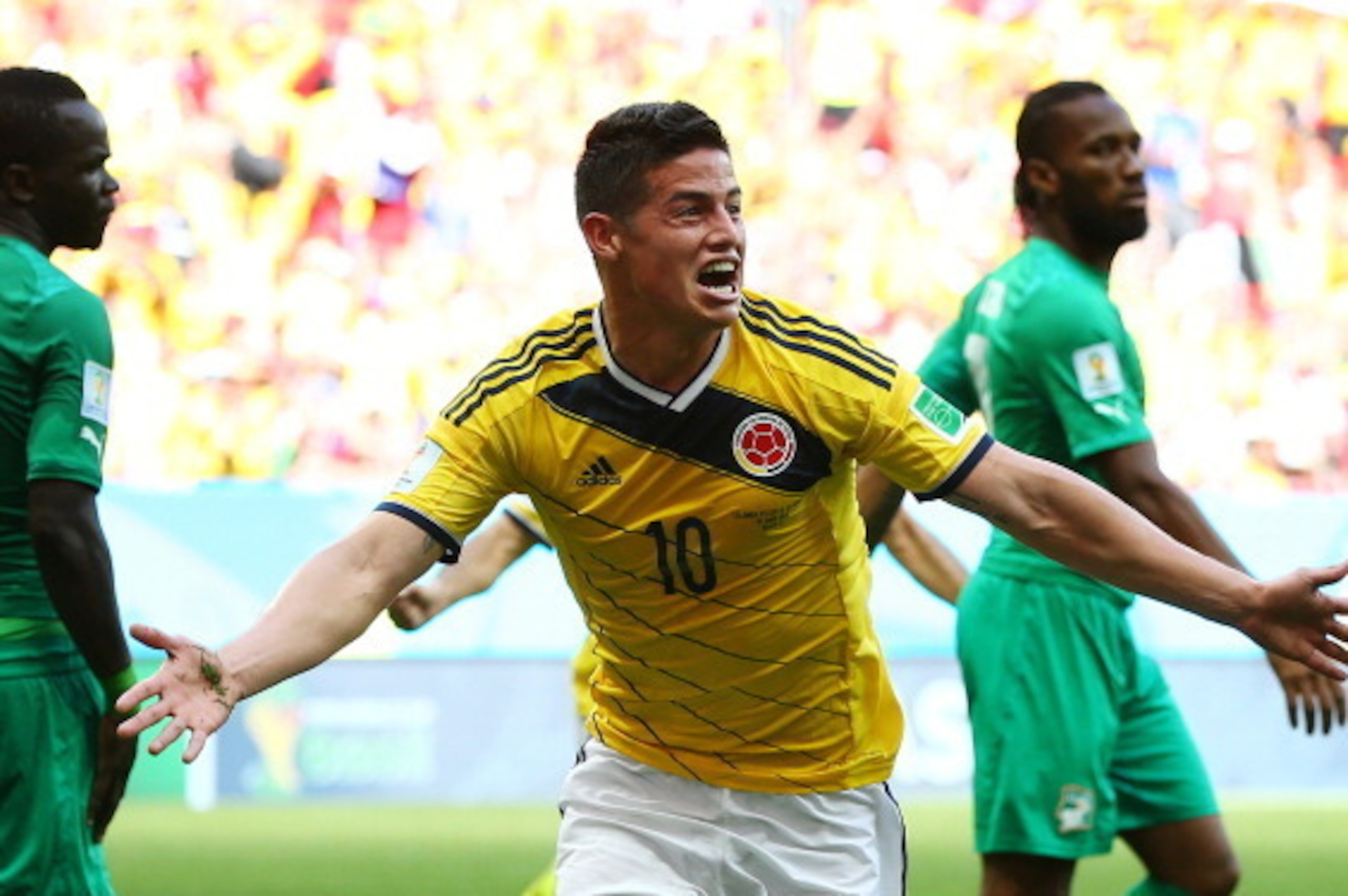 BRASILIA, BRAZIL - JUNE 19: James Rodriguez of Colombia celebrates after scoring his team's first goal during the 2014 FIFA World Cup Brazil Group C match between Colombia and Cote D'Ivoire at Estadio Nacional on June 19, 2014 in Brasilia, Brazil.  (Photo