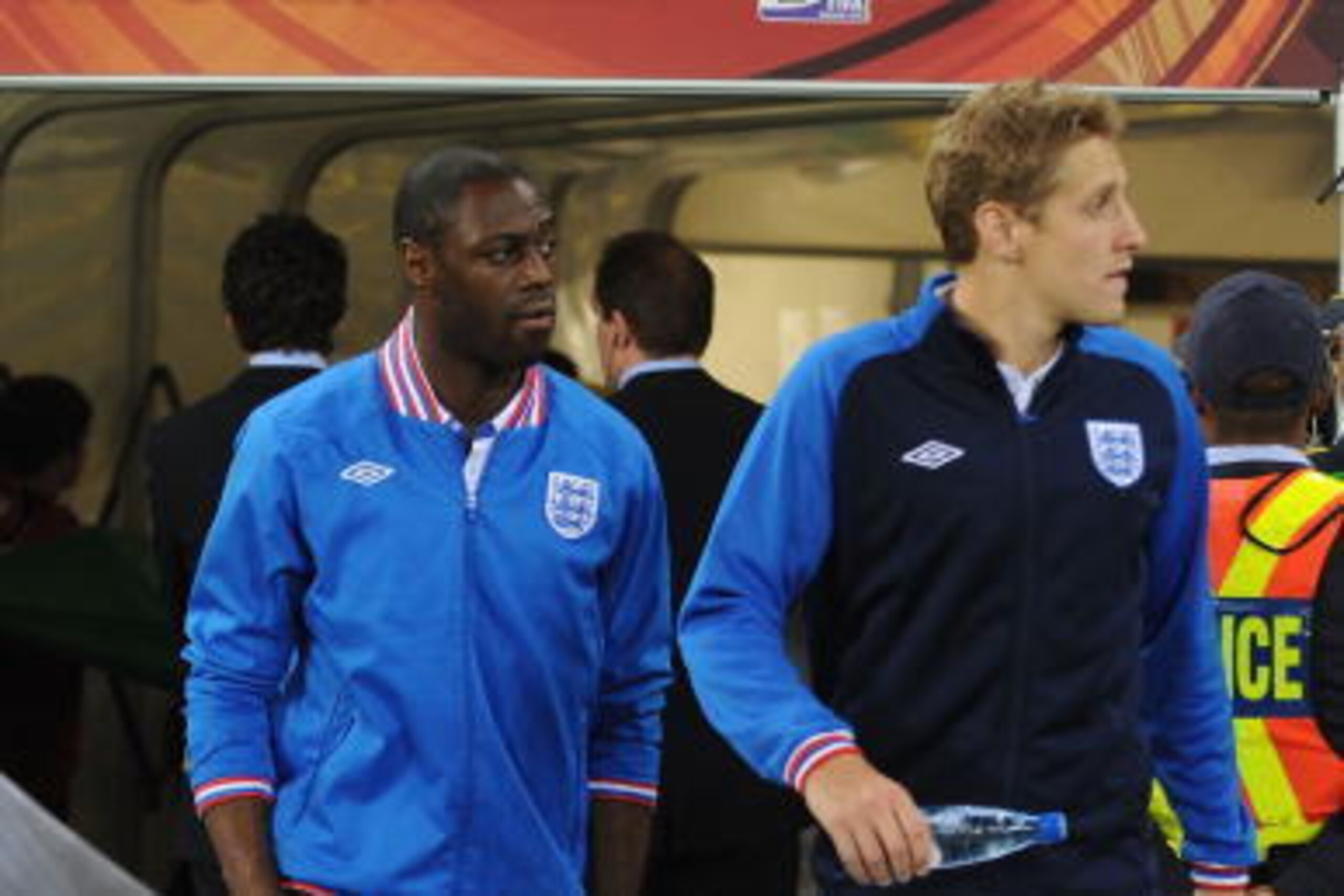 CAPE TOWN, SOUTH AFRICA - JUNE 18:  Ledley King and Michael Dawson of England walk towards the bench ahead of the 2010 FIFA World Cup South Africa Group C match between England and Algeria at Green Point Stadium on June 18, 2010 in Cape Town, South Africa