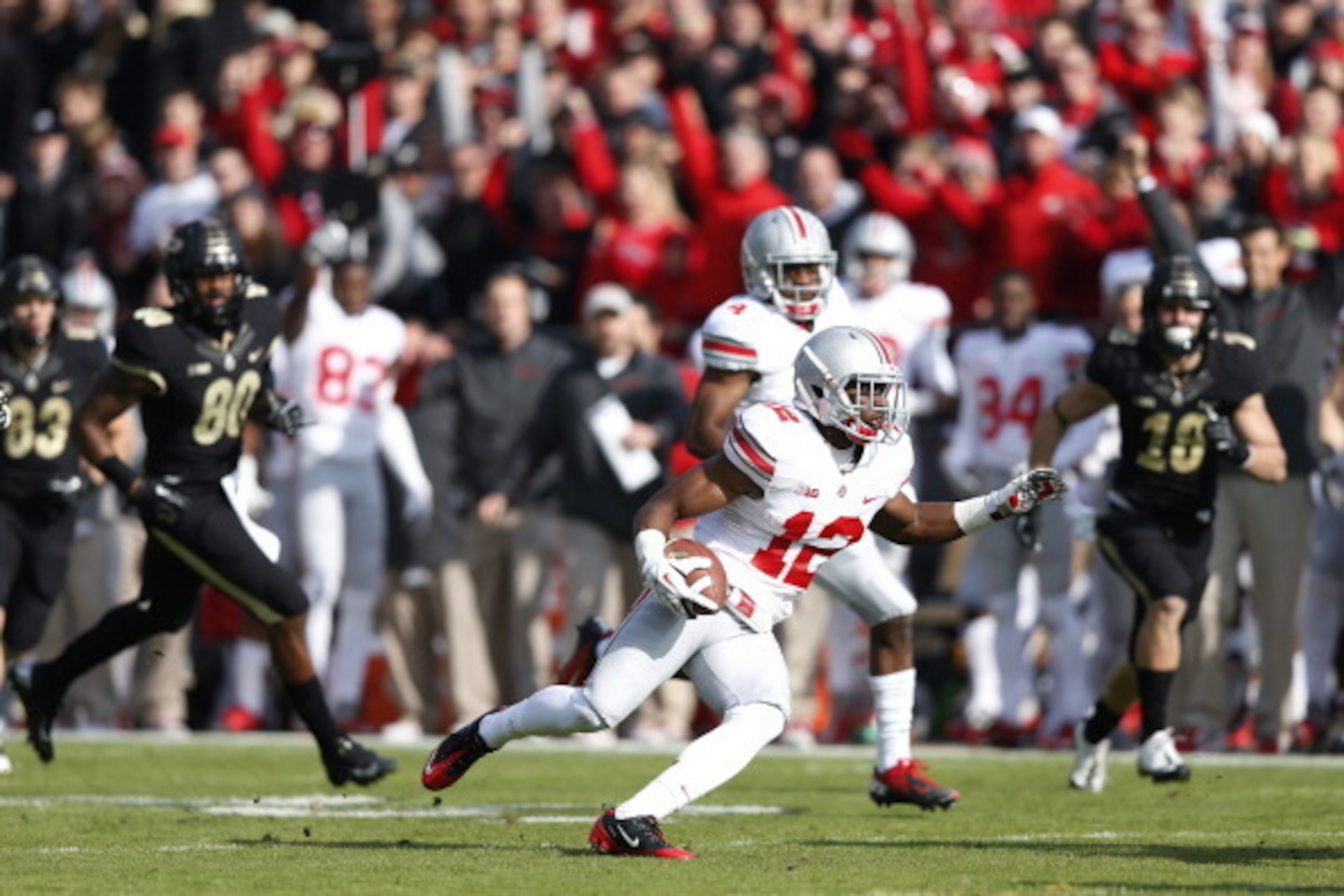 WEST LAFAYETTE, IN - NOVEMBER 2: Doran Grant #12 of the Ohio State Buckeyes returns an interception for a 33-yard touchdown in the first half of the game against the Purdue Boilermakers at Ross-Ade Stadium on November 2, 2013 in West Lafayette, Indiana. ( WEST LAFAYETTE, IN - NOVEMBER 2: Doran Grant #12 of the Ohio State Buckeyes returns an interception for a 33-yard touchdown in the first half of the game against the Purdue Boilermakers at Ross-Ade Stadium on November 2, 2013 in West Lafayette, Indiana. (