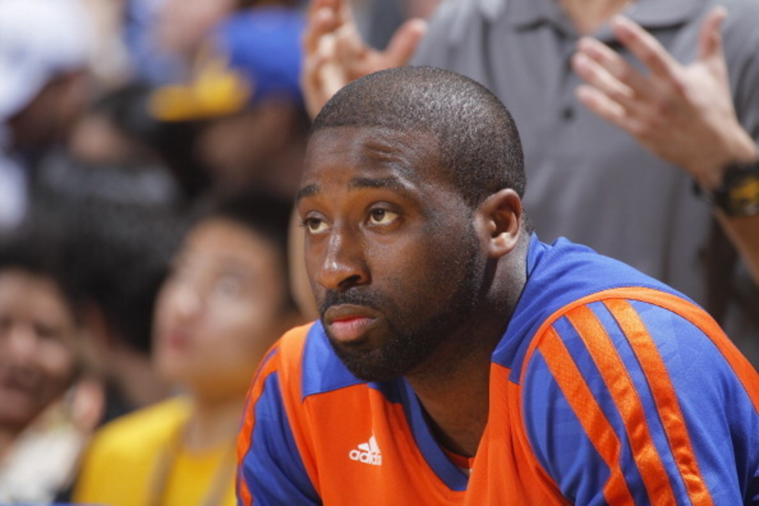 OAKLAND, CA - MARCH 30: Raymond Felton #2 of the New York Knicks rests on the bench during the game against the Golden State Warriors on March 30, 2014 at Oracle Arena in Oakland, California. NOTE TO USER: User expressly acknowledges and agrees that, by d