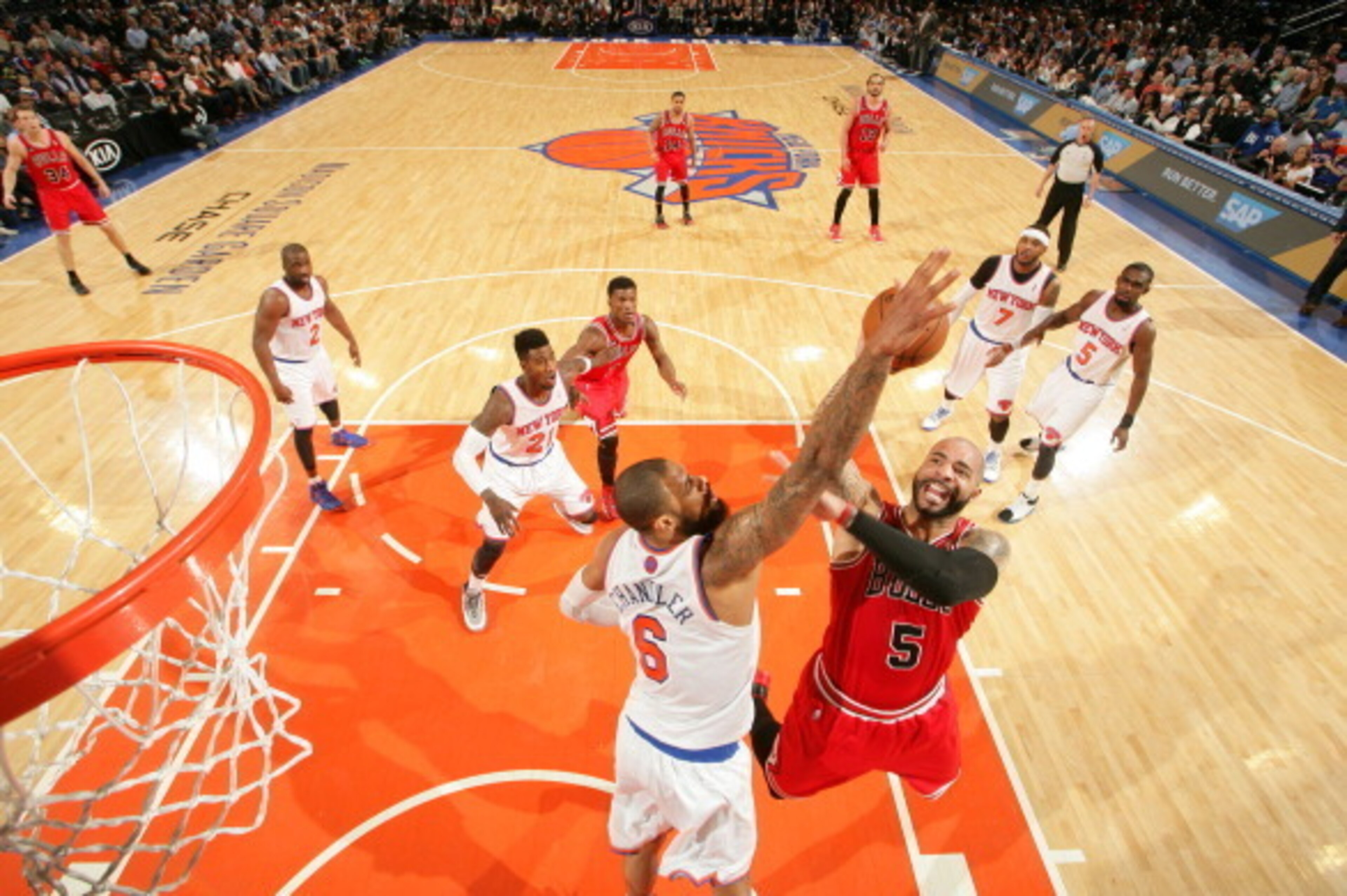 NEW YORK, NY - APRIL 13: Carlos Boozer #5 of the Chicago Bulls shoots against the New York Knicks during a game at Madison Square Garden in New York City on April 13, 2014. NOTE TO USER: User expressly acknowledges and agrees that, by downloading and or NEW YORK, NY - APRIL 13: Carlos Boozer #5 of the Chicago Bulls shoots against the New York Knicks during a game at Madison Square Garden in New York City on April 13, 2014. NOTE TO USER: User expressly acknowledges and agrees that, by downloading and or