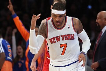 NEW YORK, NY - DECEMBER 11:  Carmelo Anthony #7 of the New York Knicks celebrates a three pointer in the second quarter against the Chicago Bulls at Madison Square Garden on December 11, 2013 in New York City. NOTE TO USER: User expressly acknowledges and