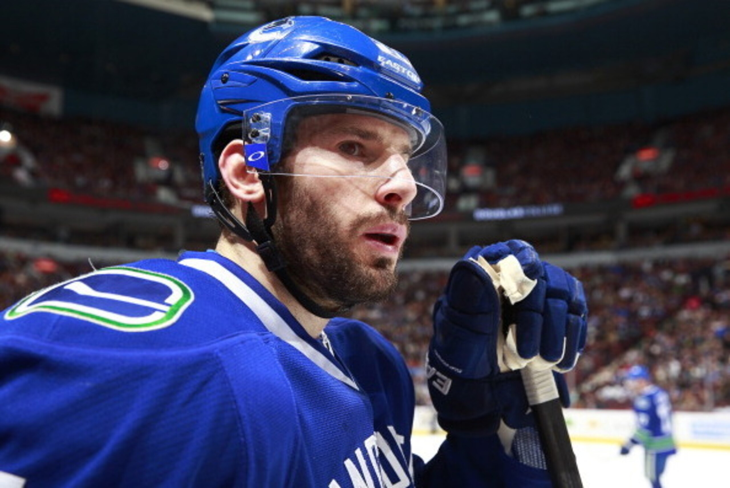 VANCOUVER, BC - APRIL 7:  Ryan Kesler #17 of the Vancouver Canucks looks on from the bench during their NHL game against the Anaheim Ducks at Rogers Arena April 7, 2014 in Vancouver, British Columbia, Canada.  Anaheim won 3-0 to eliminate the Canucks from