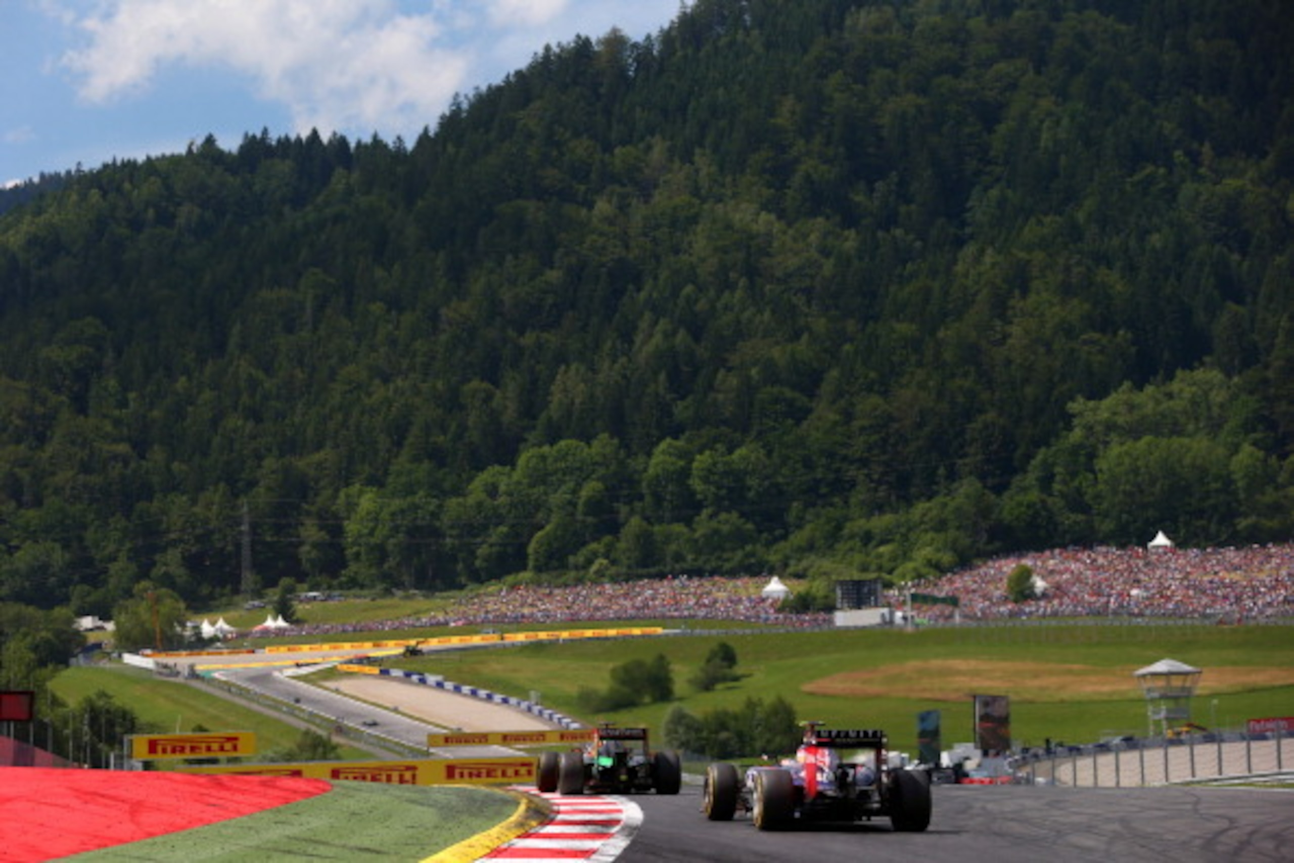 SPIELBERG, AUSTRIA - JUNE 22: Daniel Ricciardo of Australia and Infiniti Red Bull Racing drives during the Austrian Formula One Grand Prix at Red Bull Ring on June 22, 2014 in Spielberg, Austria. (Photo by Mark Thompson/Getty Images) SPIELBERG, AUSTRIA - JUNE 22: Daniel Ricciardo of Australia and Infiniti Red Bull Racing drives during the Austrian Formula One Grand Prix at Red Bull Ring on June 22, 2014 in Spielberg, Austria. (Photo by Mark Thompson/Getty Images)