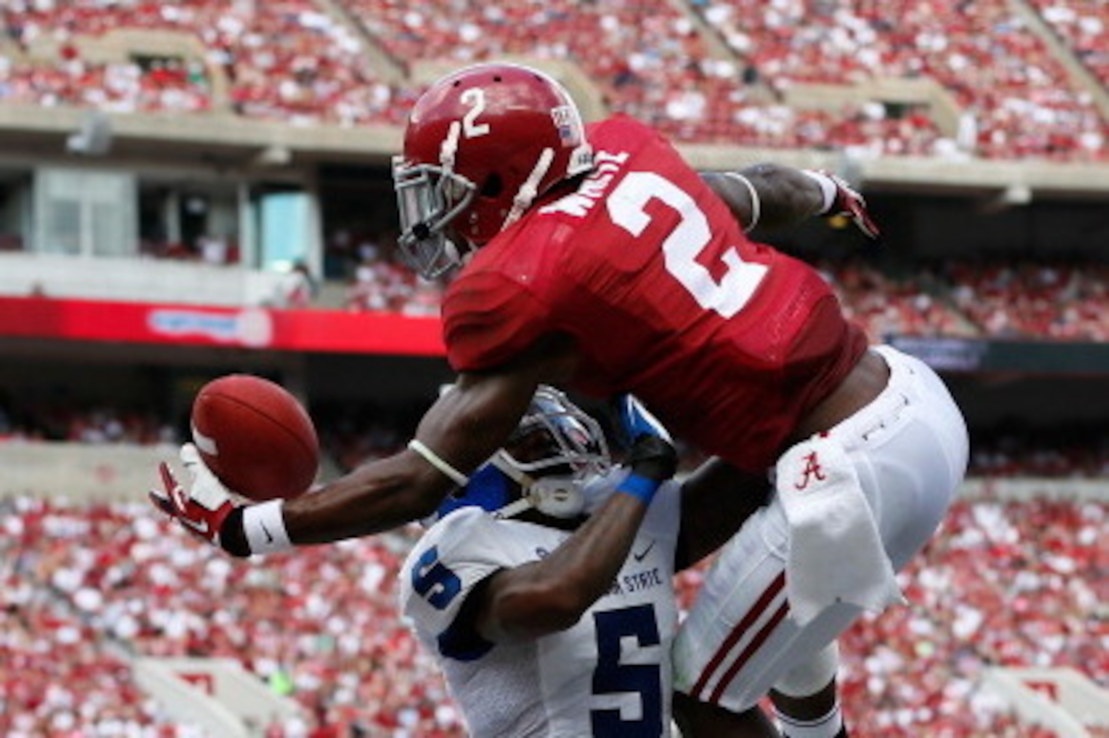 TUSCALOOSA, AL - OCTOBER 05:  DeAndrew White #2 of the Alabama Crimson Tide pulls in this touchdown reception against Demarius Matthews #5 of the Georgia State Panthers at Bryant-Denny Stadium on October 5, 2013 in Tuscaloosa, Alabama.  (Photo by Kevin C.