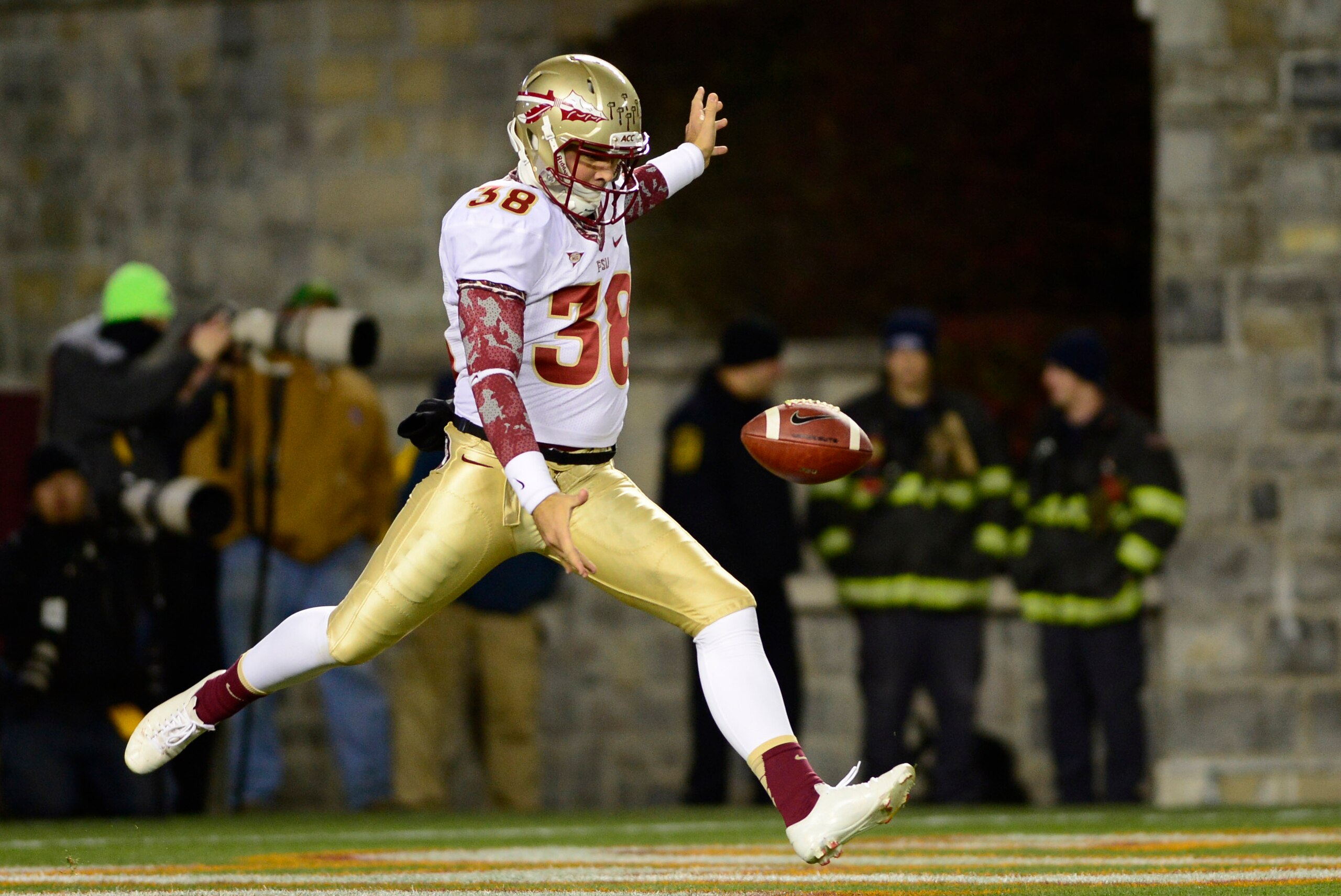 Nov 8, 2012; Blacksburg, VA, USA; Florida State Seminoles punter Cason Beatty (38) punts in the third quarter at Lane Stadium.  Mandatory Credit: Bob Donnan-USA TODAY Sports