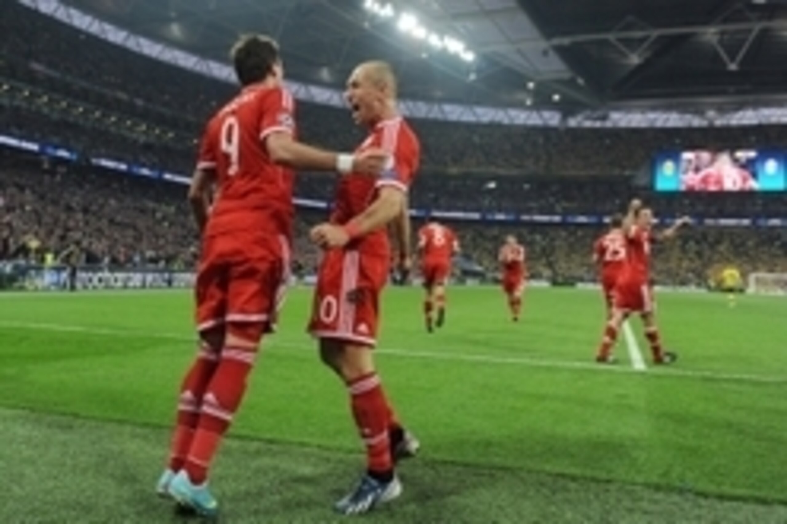 May 25, 2013; London, UNITED KINGDOM; Bayern Munich player Mario Mandzukic (left) celebrates with teammates including Arjen Robben after scoring a goal against Borussia Dortmund in the second half during the Champions League final at Wembley Stadium. Mand May 25, 2013; London, UNITED KINGDOM; Bayern Munich player Mario Mandzukic (left) celebrates with teammates including Arjen Robben after scoring a goal against Borussia Dortmund in the second half during the Champions League final at Wembley Stadium. Mand