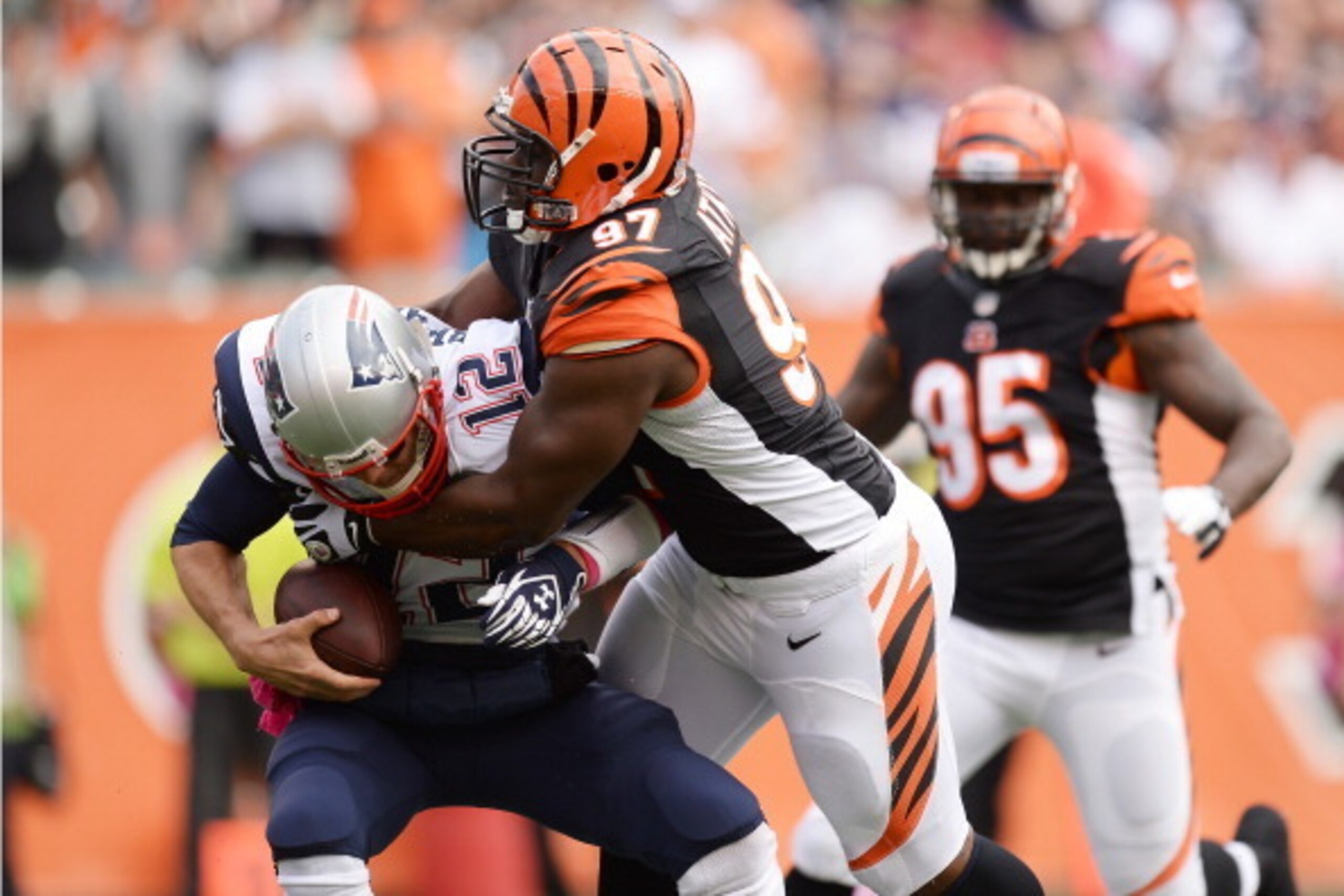 CINCINNATI, OH - OCTOBER 6: Geno Atkins #97 of the Cincinnati Bengals sacks quarterback Tom Brady #12 of the New England Patriots in the first quarter at Paul Brown Stadium on October 6, 2013 in Cincinnati, Ohio. (Photo by Jamie Sabau/Getty Images) CINCINNATI, OH - OCTOBER 6: Geno Atkins #97 of the Cincinnati Bengals sacks quarterback Tom Brady #12 of the New England Patriots in the first quarter at Paul Brown Stadium on October 6, 2013 in Cincinnati, Ohio. (Photo by Jamie Sabau/Getty Images)