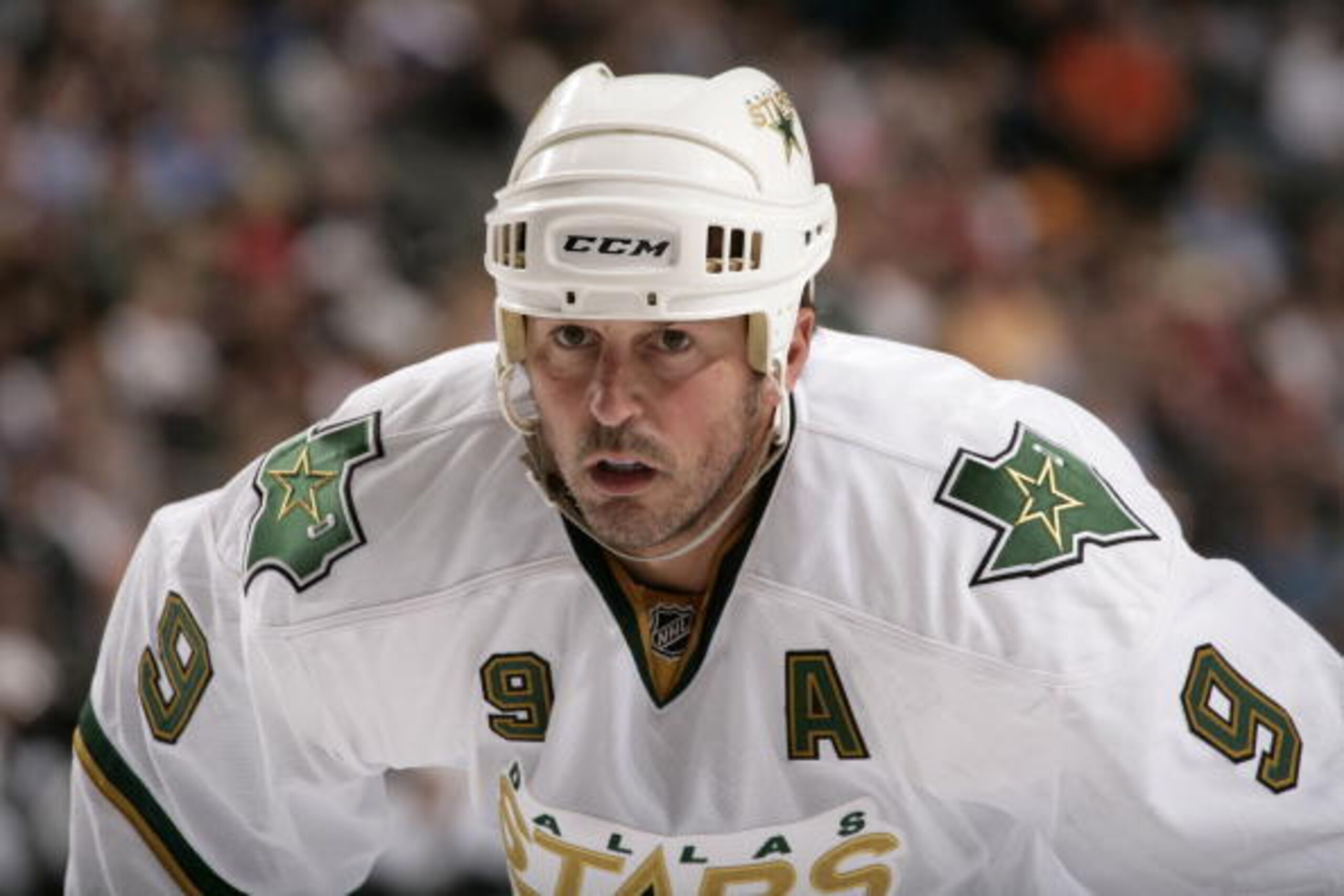 DALLAS - APRIL 6: Mike Modano #9 of the Dallas Stars gets set to take a face off against the Chicago Blackhawks on April 6, 2010 at the American Airlines Center in Dallas, Texas.  (Photo by Glenn James/NHLI via Getty Images)