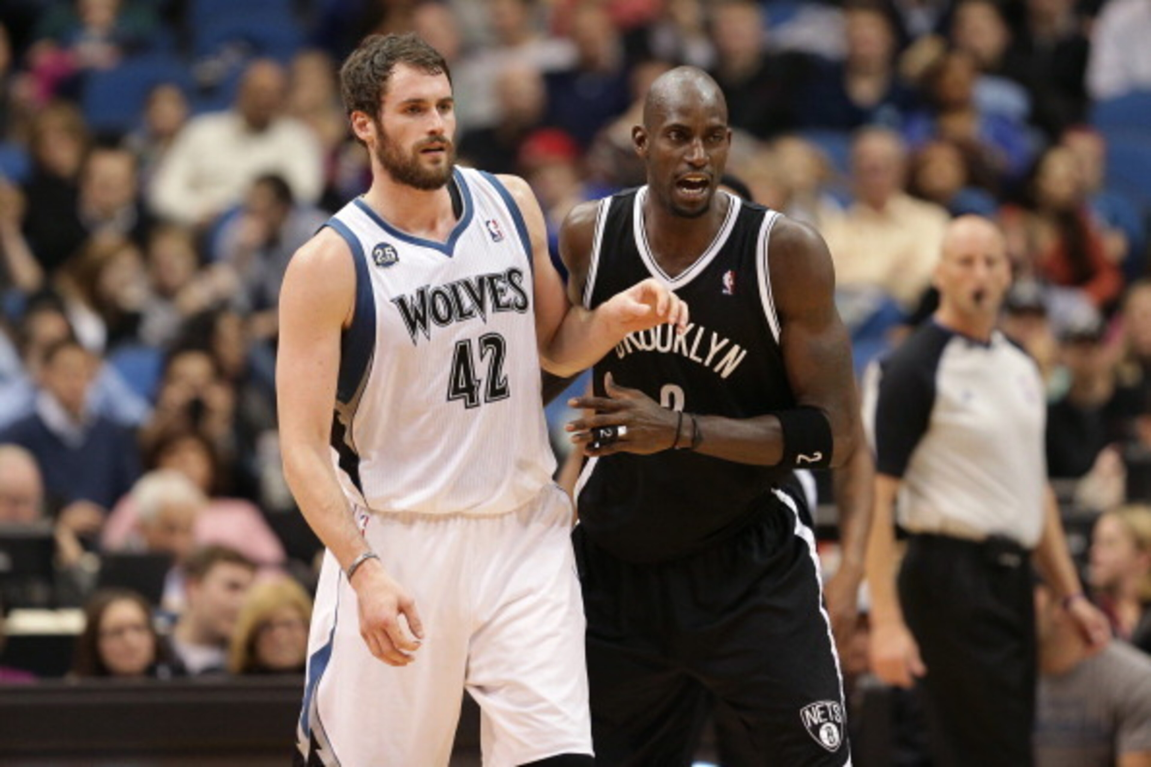 MINNEAPOLIS, MN - NOVEMBER 22:  Kevin Love #42 of the Minnesota Timberwolves boxes out Kevin Garnett #2 of the Brooklyn Nets on November 22, 2013 at Target Center in Minneapolis, Minnesota. NOTE TO USER: User expressly acknowledges and agrees that, by dow