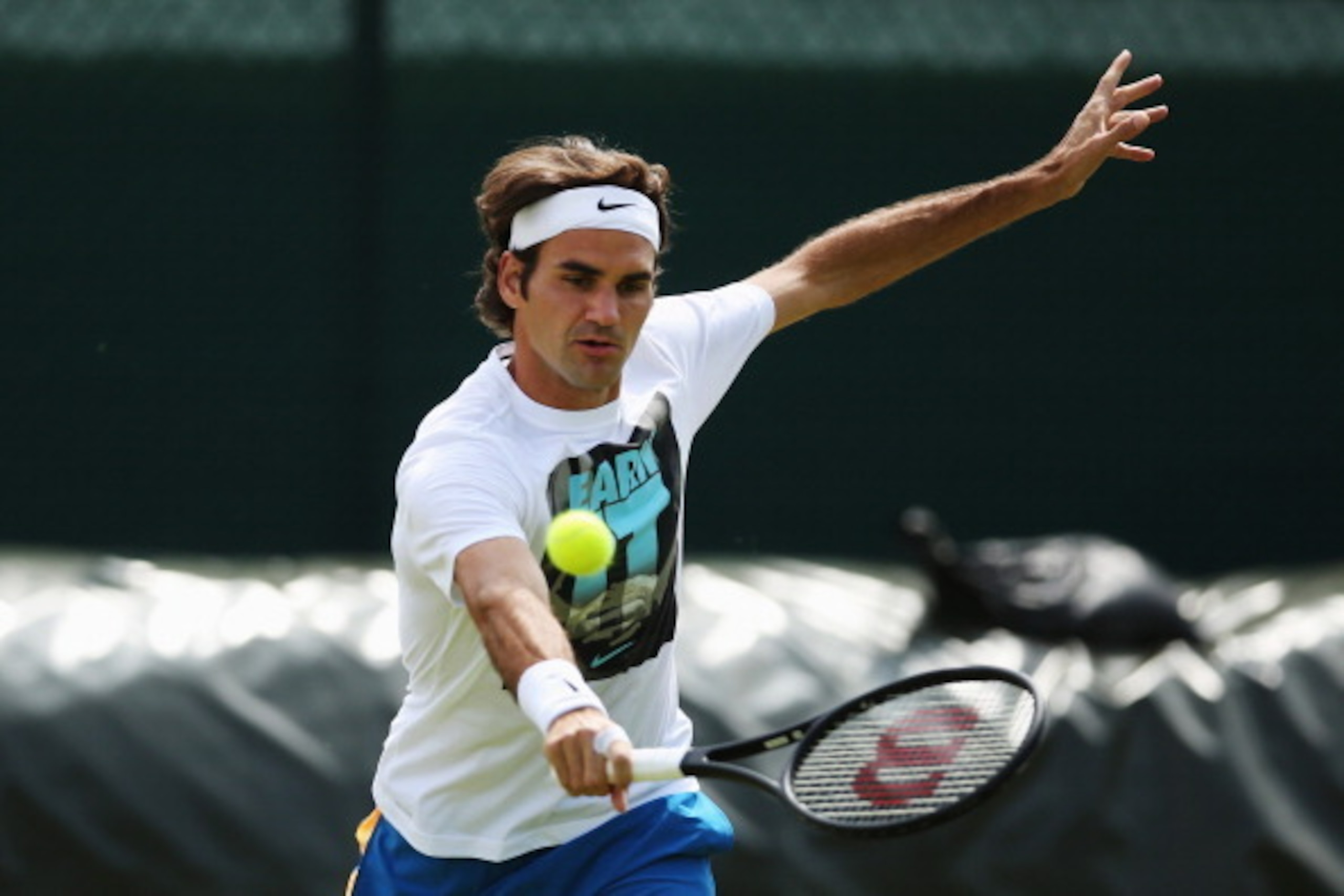 LONDON, ENGLAND - JUNE 23:  Roger Federer of Switzerland during a practice session on day one of the Wimbledon Lawn Tennis Championships at the All England Lawn Tennis and Croquet Club at Wimbledon on June 23, 2014 in London, England.  (Photo by Dan Kitwo