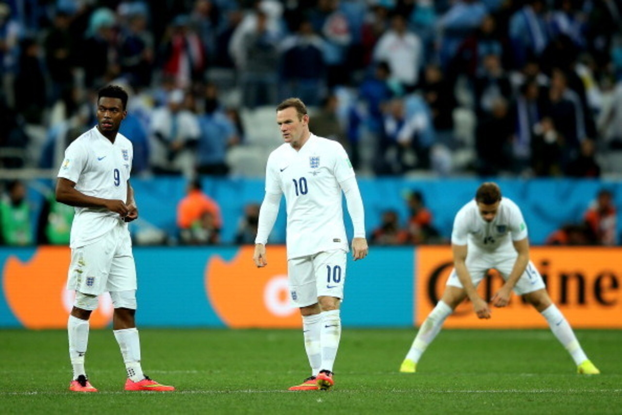SAO PAULO, BRAZIL - JUNE 19:  Daniel Sturridge and Wayne Rooney of England look dejected during the 2014 FIFA World Cup Brazil Group D match between Uruguay and England at Arena de Sao Paulo on June 19, 2014 in Sao Paulo, Brazil.  (Photo by Richard Heathc