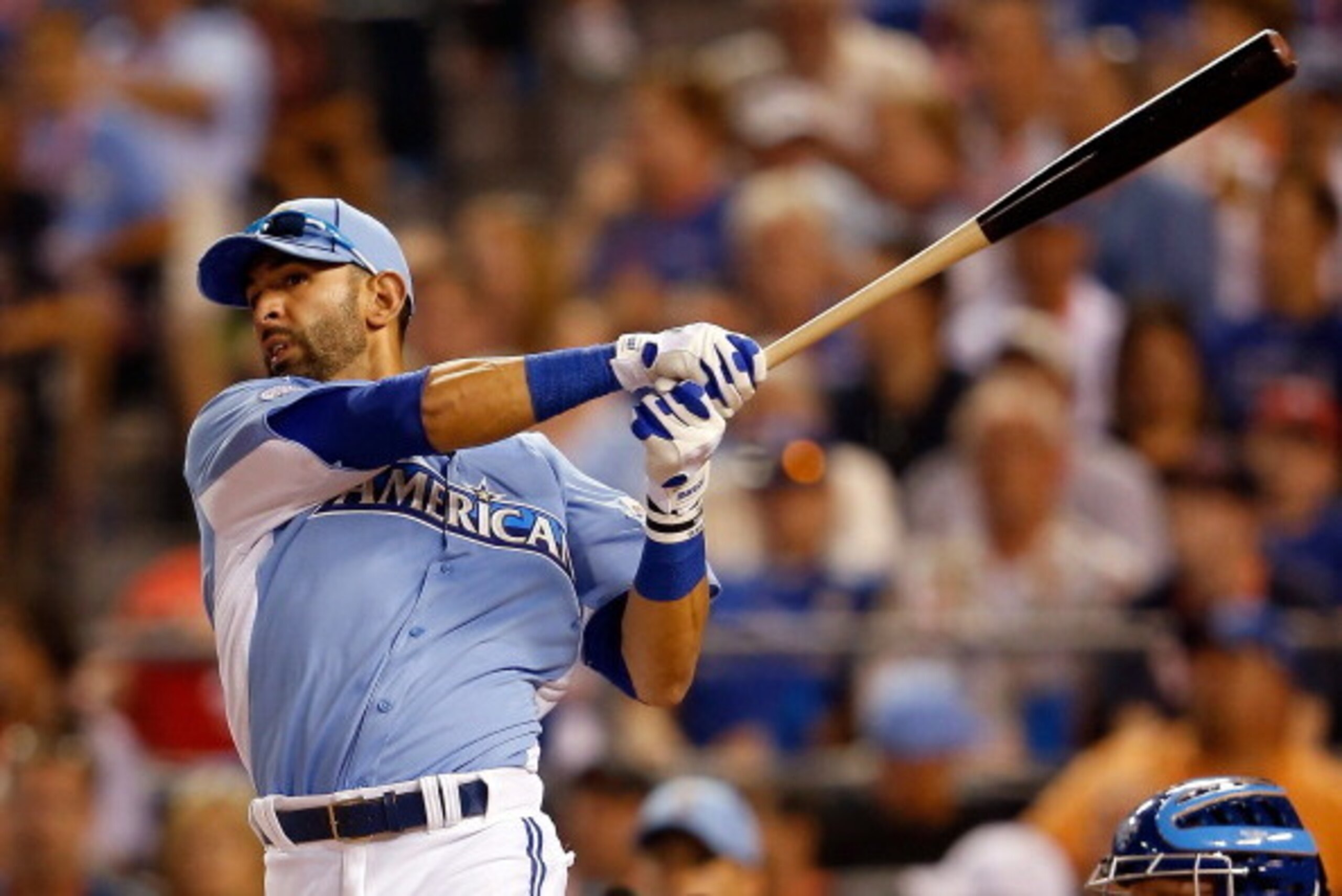KANSAS CITY, MO - JULY 09:  American League All-Star Jose Bautista #19 of the Toronto Blue Jays at bat to break a tie with American League All-Star Mark Trumbo #44 of the Los Angeles Angels of Anaheim during the State Farm Home Run Derby at Kauffman Stadi