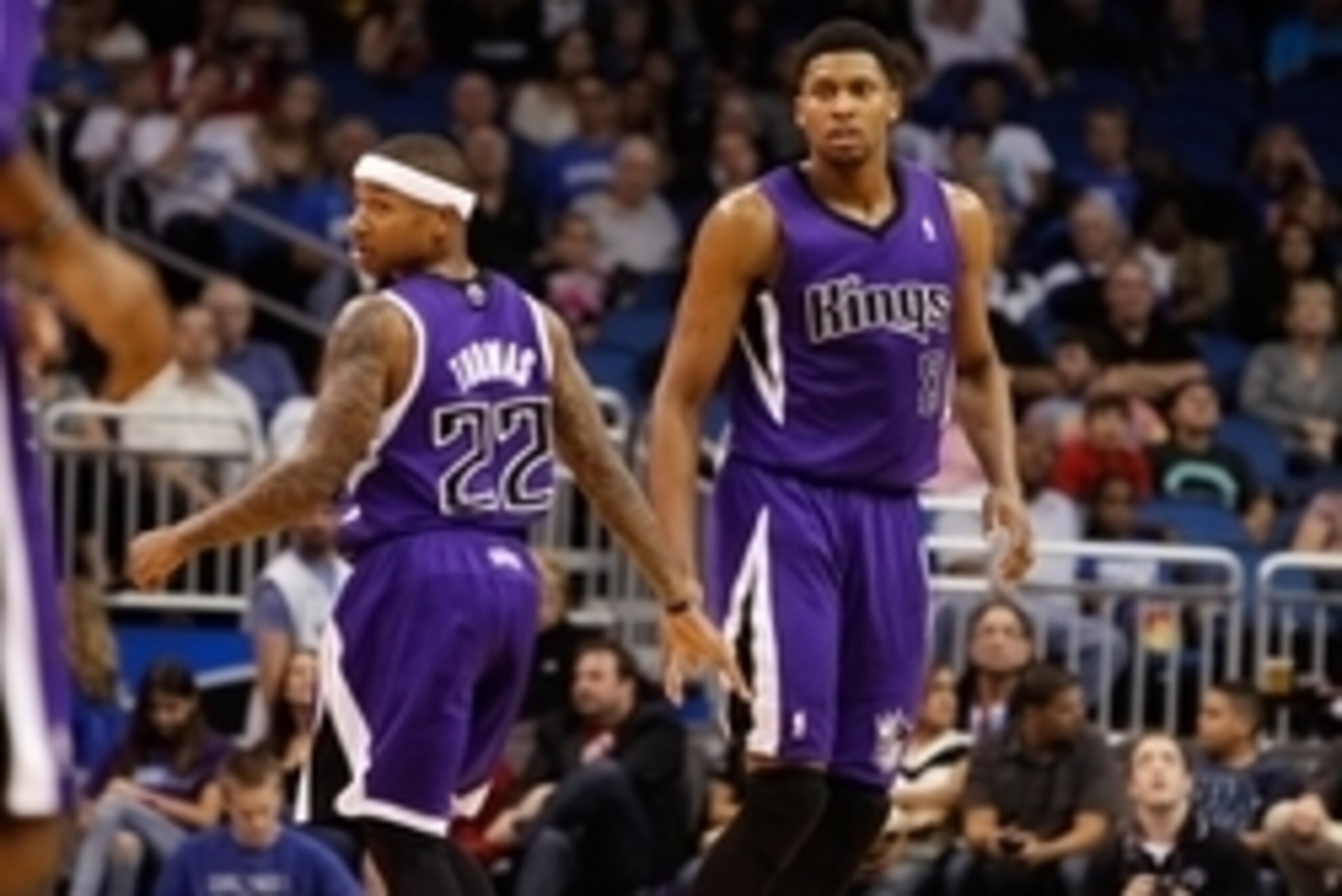 Dec 21, 2013; Orlando, FL, USA; Sacramento Kings small forward Rudy Gay (8) and point guard Isaiah Thomas (22) high five against the Orlando Magic during the second quarter at Amway Center. Mandatory Credit: Kim Klement-USA TODAY Sports