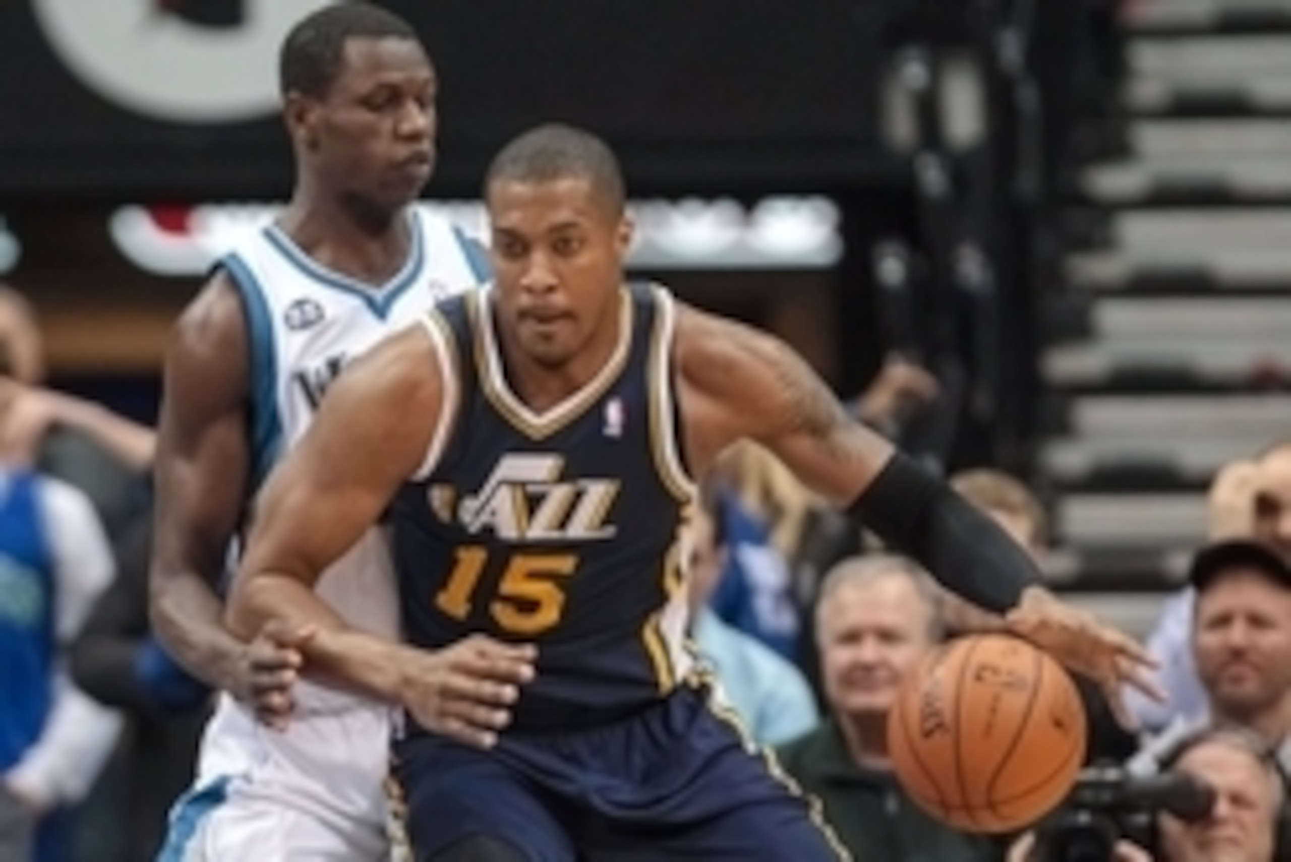Apr 16, 2014; Minneapolis, MN, USA; Utah Jazz center Derrick Favors (15) dribbles in the first quarter against the Minnesota Timberwolves center Gorgui Dieng (5) at Target Center. Mandatory Credit: Brad Rempel-USA TODAY Sports Apr 16, 2014; Minneapolis, MN, USA; Utah Jazz center Derrick Favors (15) dribbles in the first quarter against the Minnesota Timberwolves center Gorgui Dieng (5) at Target Center. Mandatory Credit: Brad Rempel-USA TODAY Sports