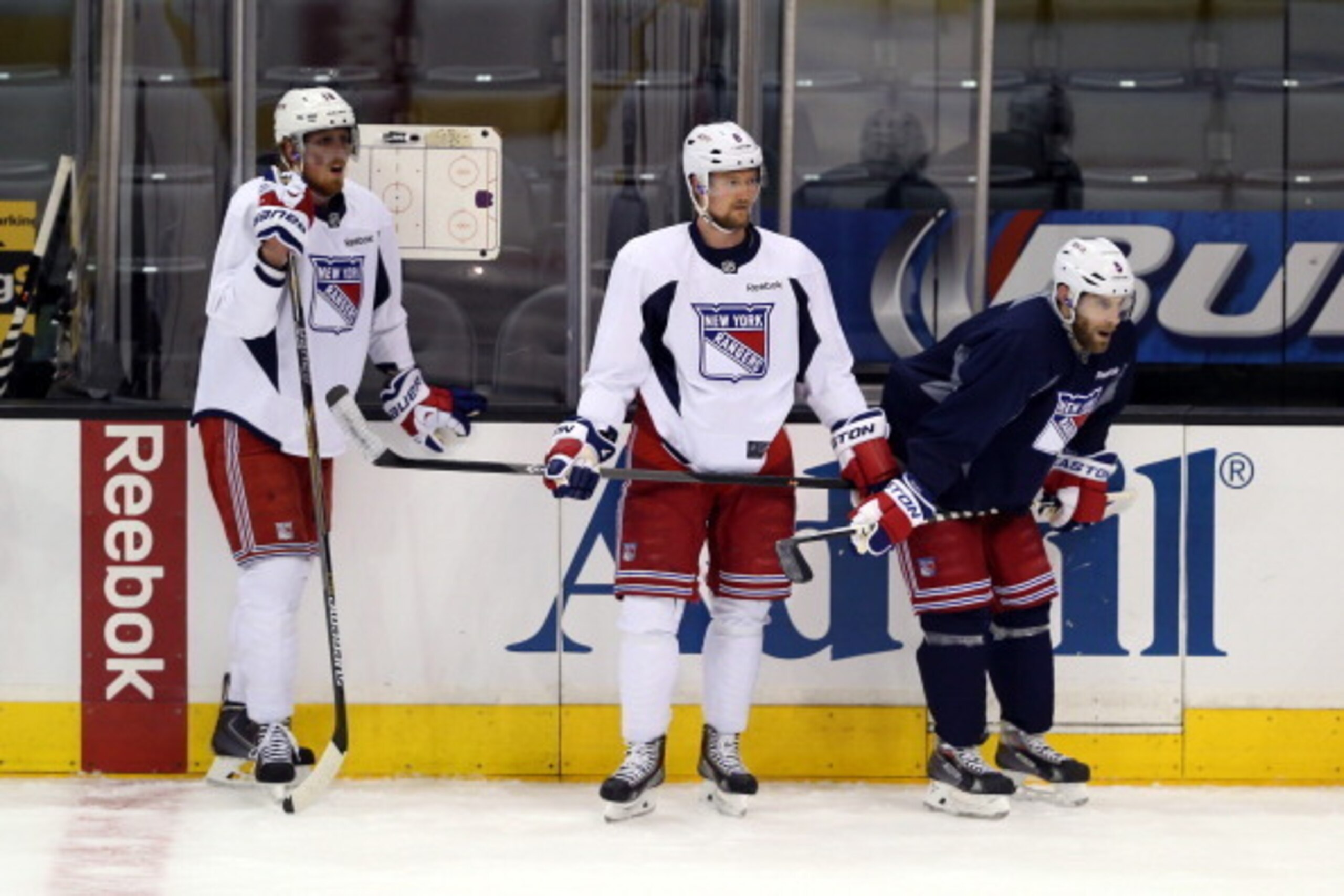 LOS ANGELES, CA - JUNE 03:  Marc Staal #18, Anton Stralman #6 and Dan Girardi #5 of the New York Rangers look on during a practice session ahead of the 2014 NHL Stanley Cup Final at Staples Center on June 3, 2014 in Los Angeles, California.  (Photo by Bru