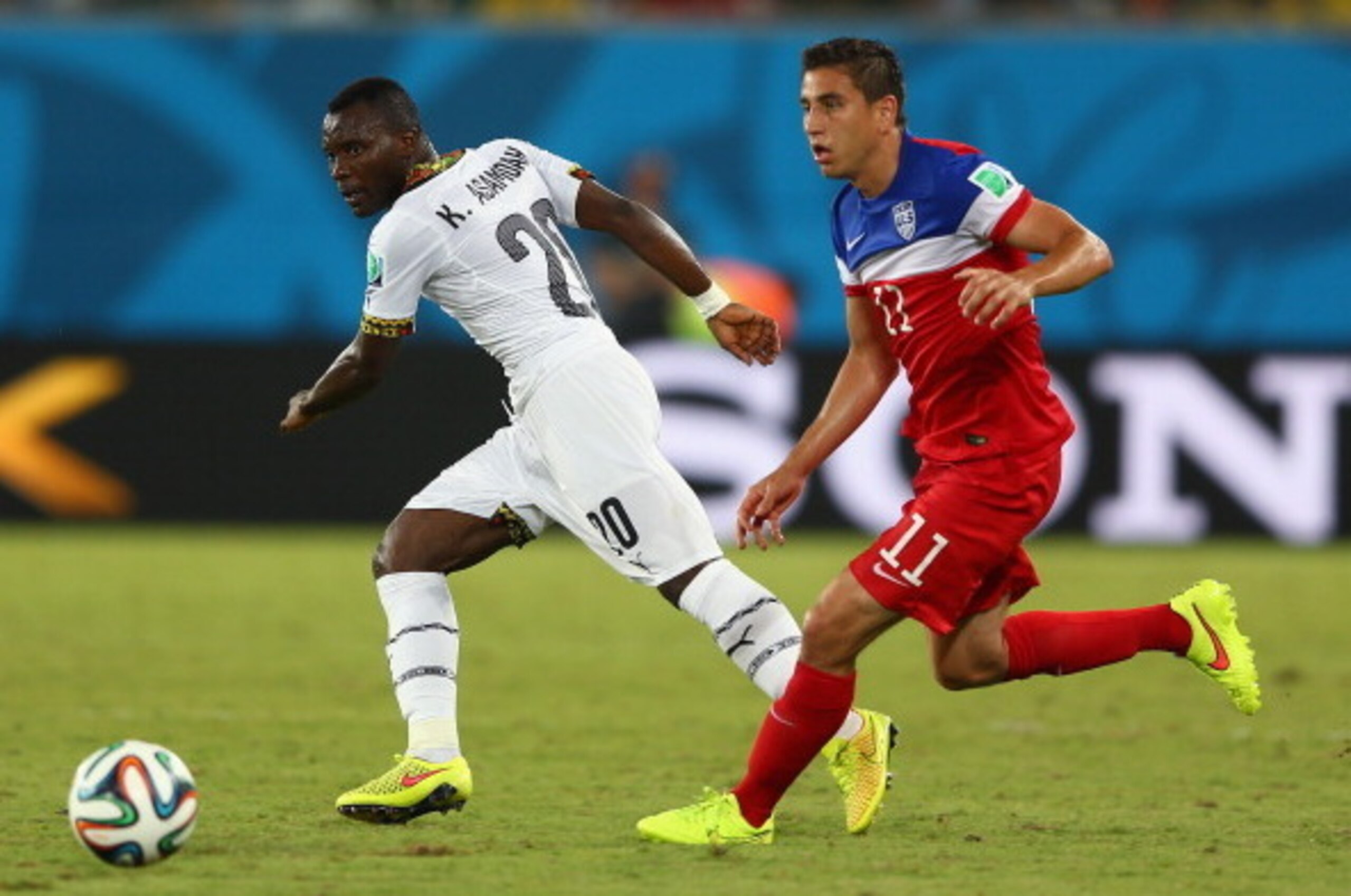 NATAL, BRAZIL - JUNE 16:  John Boye of Ghana and Alejandro Bedoya of the United States battle for the ball during the 2014 FIFA World Cup Brazil Group G match between Ghana and the United States at Estadio das Dunas on June 16, 2014 in Natal, Brazil.  (Ph