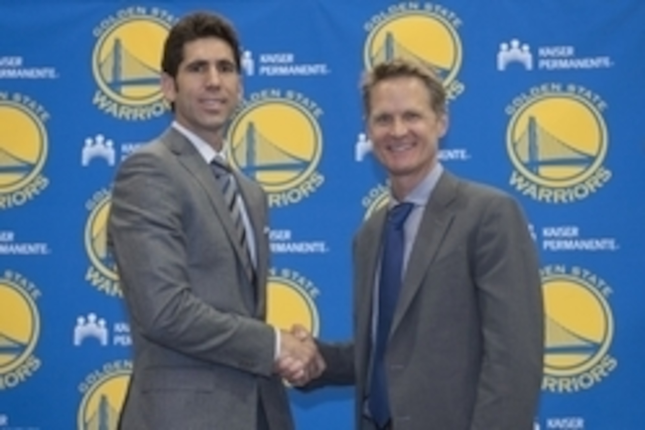 May 20, 2014; Oakland, CA, USA; Steve Kerr (right) poses for a photo with Golden State Warriors general manager Bob Myers (left) in a press conference after naming Kerr as the new head coach for the Warriors at the Warriors Practice Facility. Mandatory Cr