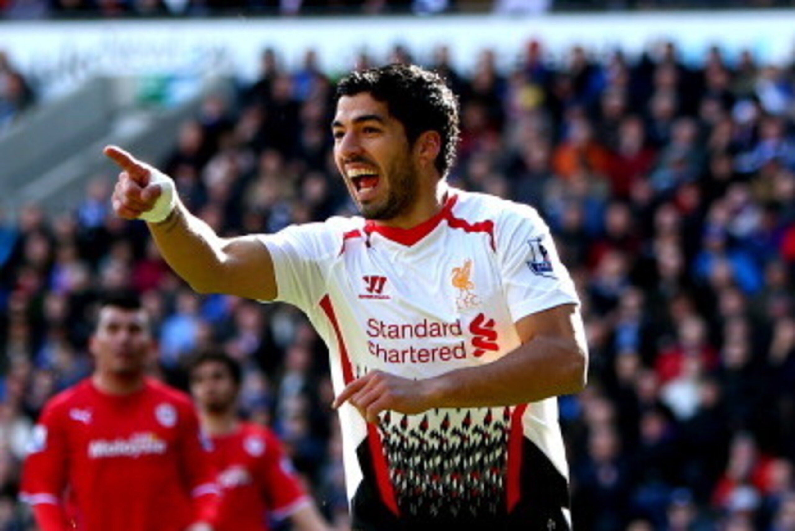 CARDIFF, WALES - MARCH 22:  Luis Suarez of Liverpool scores a goal to level the scores at 1-1 during the Barclays Premier League match between Cardiff City and Liverpool at Cardiff City Stadium on March 22, 2014 in Cardiff, Wales.  (Photo by Michael Steel