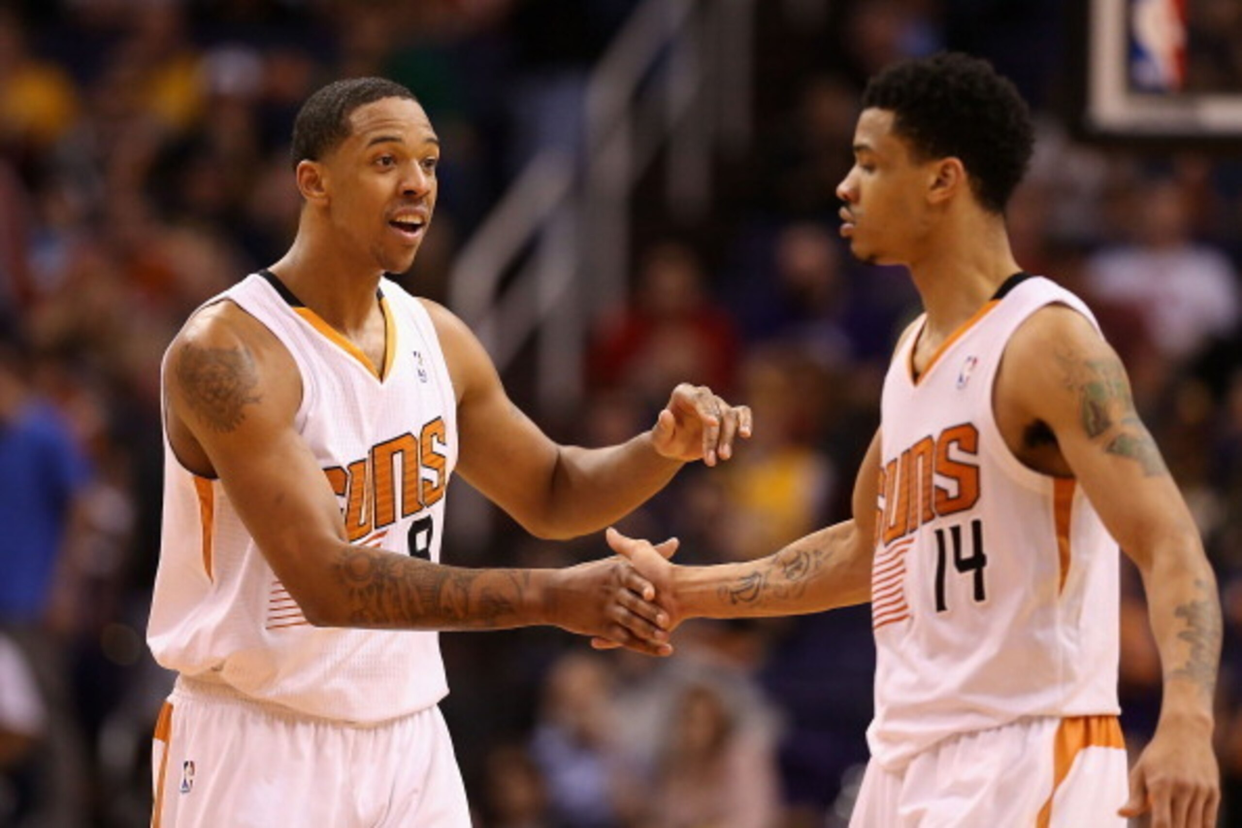 PHOENIX, AZ - JANUARY 22: Channing Frye #8 of the Phoenix Suns high fives Gerald Green #14 after scoring against the Indiana Pacers during the second half of the NBA game at US Airways Center on January 22, 2014 in Phoenix, Arizona. The Suns defeated the PHOENIX, AZ - JANUARY 22: Channing Frye #8 of the Phoenix Suns high fives Gerald Green #14 after scoring against the Indiana Pacers during the second half of the NBA game at US Airways Center on January 22, 2014 in Phoenix, Arizona. The Suns defeated the