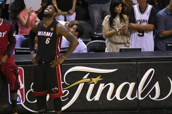 SAN ANTONIO, TX - JUNE 15:  LeBron James #6 of the Miami Heat waits for play to resume as he plays the San Antonio Spurs in Game Five of the 2014 NBA Finals at the AT&T Center on June 15, 2014 in San Antonio, Texas. NOTE TO USER: User expressly acknowledg
