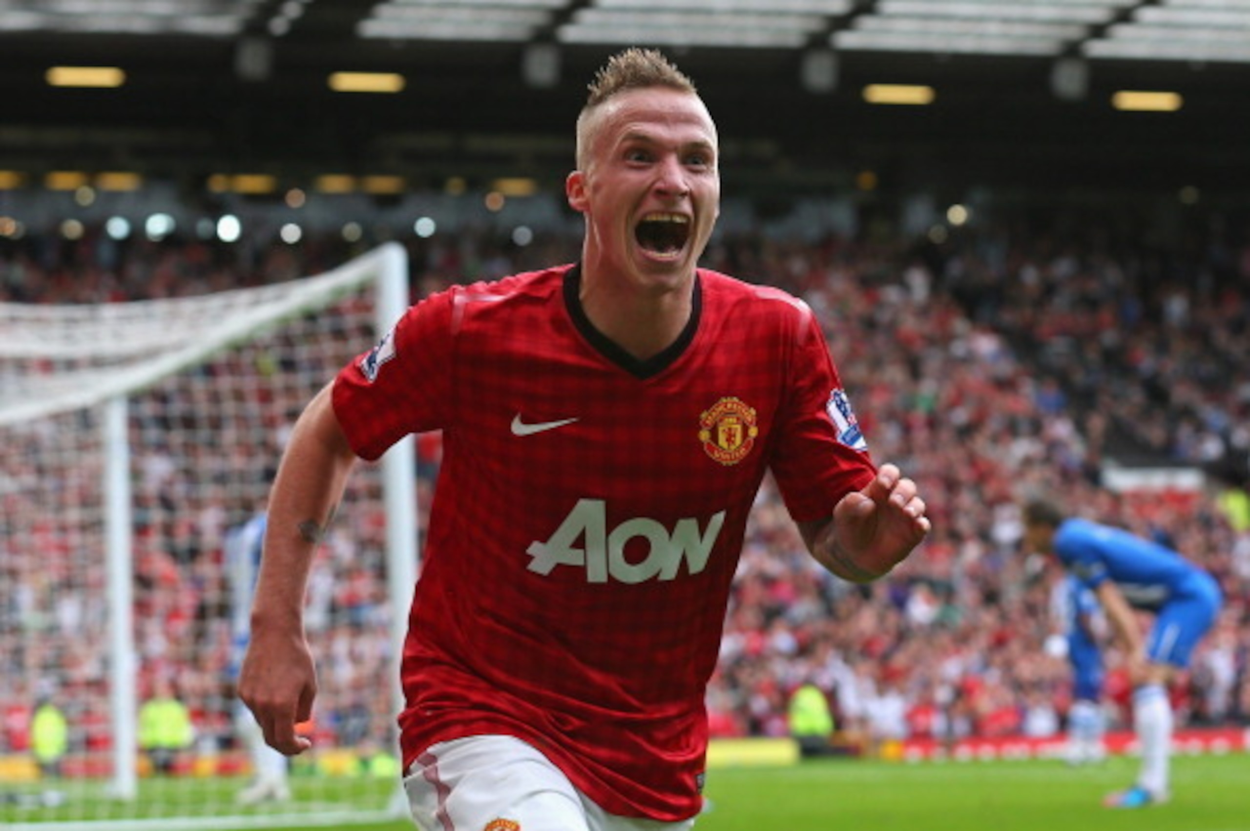 MANCHESTER, ENGLAND - SEPTEMBER 15:  Alexander Buttner of Manchester United celebrates after scoring the third goal during the Barclays Premier League match between Manchester United and Wigan Athletic at Old Trafford on September 15, 2012 in Manchester, 