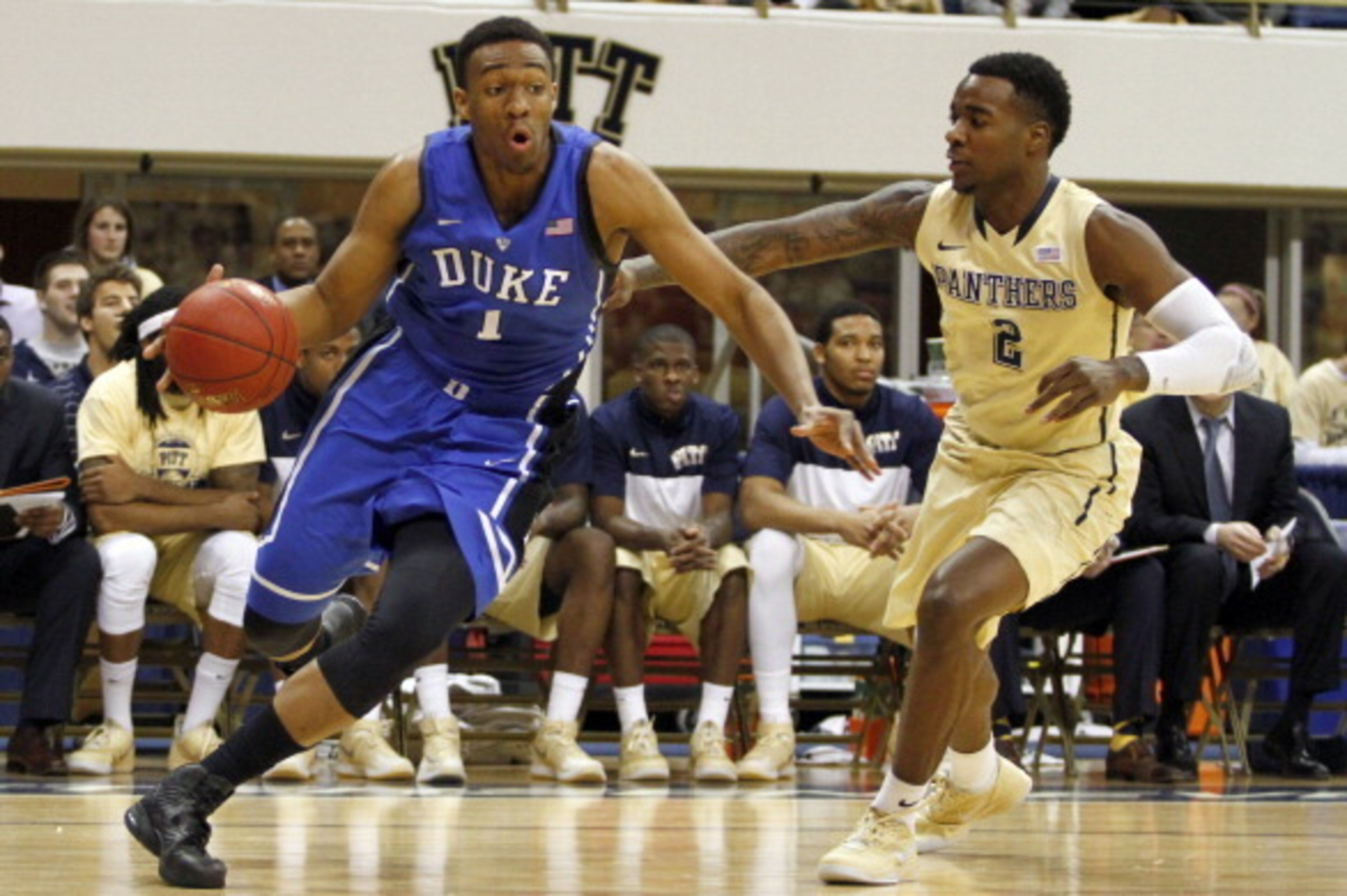 PITTSBURGH, PA - JANUARY 27:  Jabari Parker #1 of the Duke Blue Devils drives to the hoop against Michael Young #2 of the Pittsburgh Panthers at Petersen Events Center on January 27, 2014 in Pittsburgh, Pennsylvania.  (Photo by Justin K. Aller/Getty Image