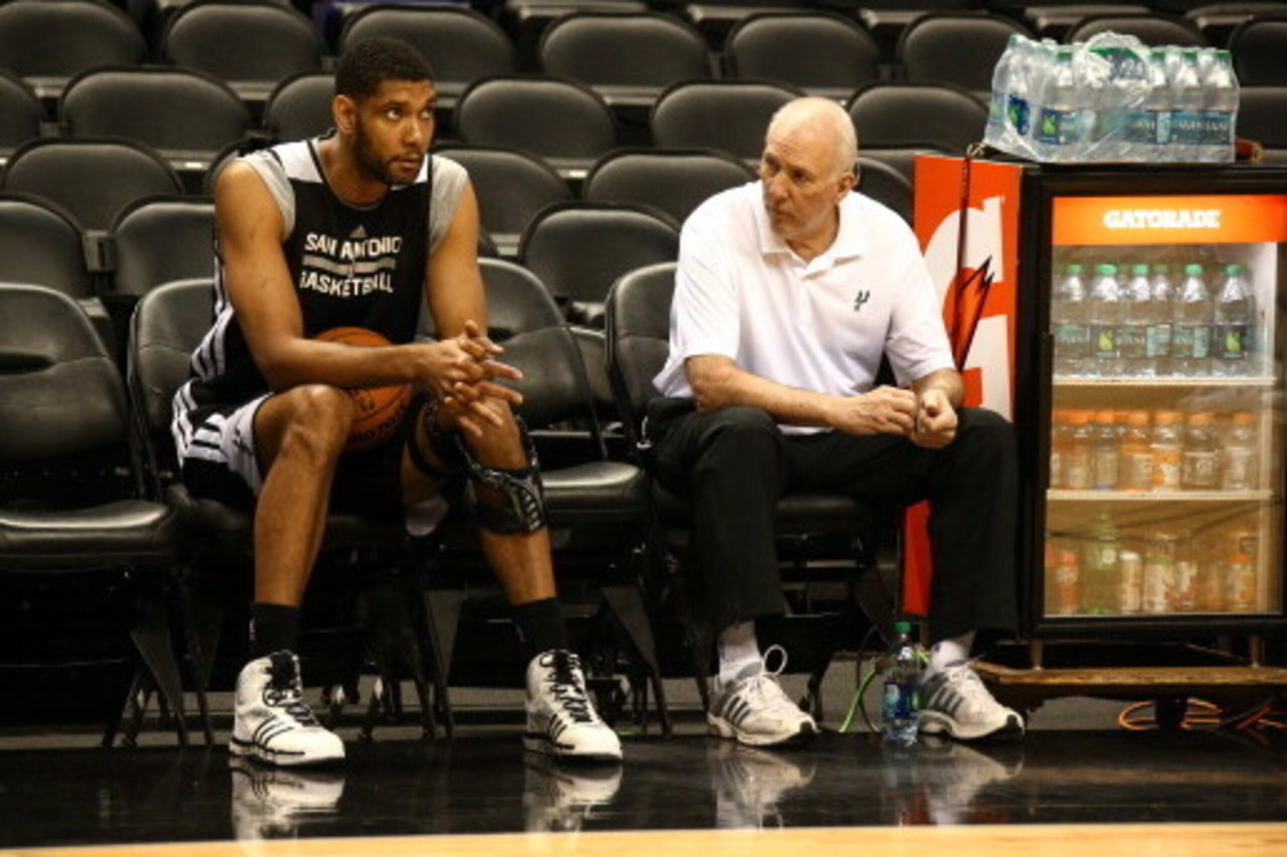 SAN ANTONIO, TX JUNE 04: Tim Duncan #21 and head coach Gregg Popovich of the San Antonio Spurs talk during practice as part of the 2014 NBA Finals on June 04, 2014 at AT&T Center in San Antonio, Texas. NOTE TO USER: User expressly acknowledges and agrees 