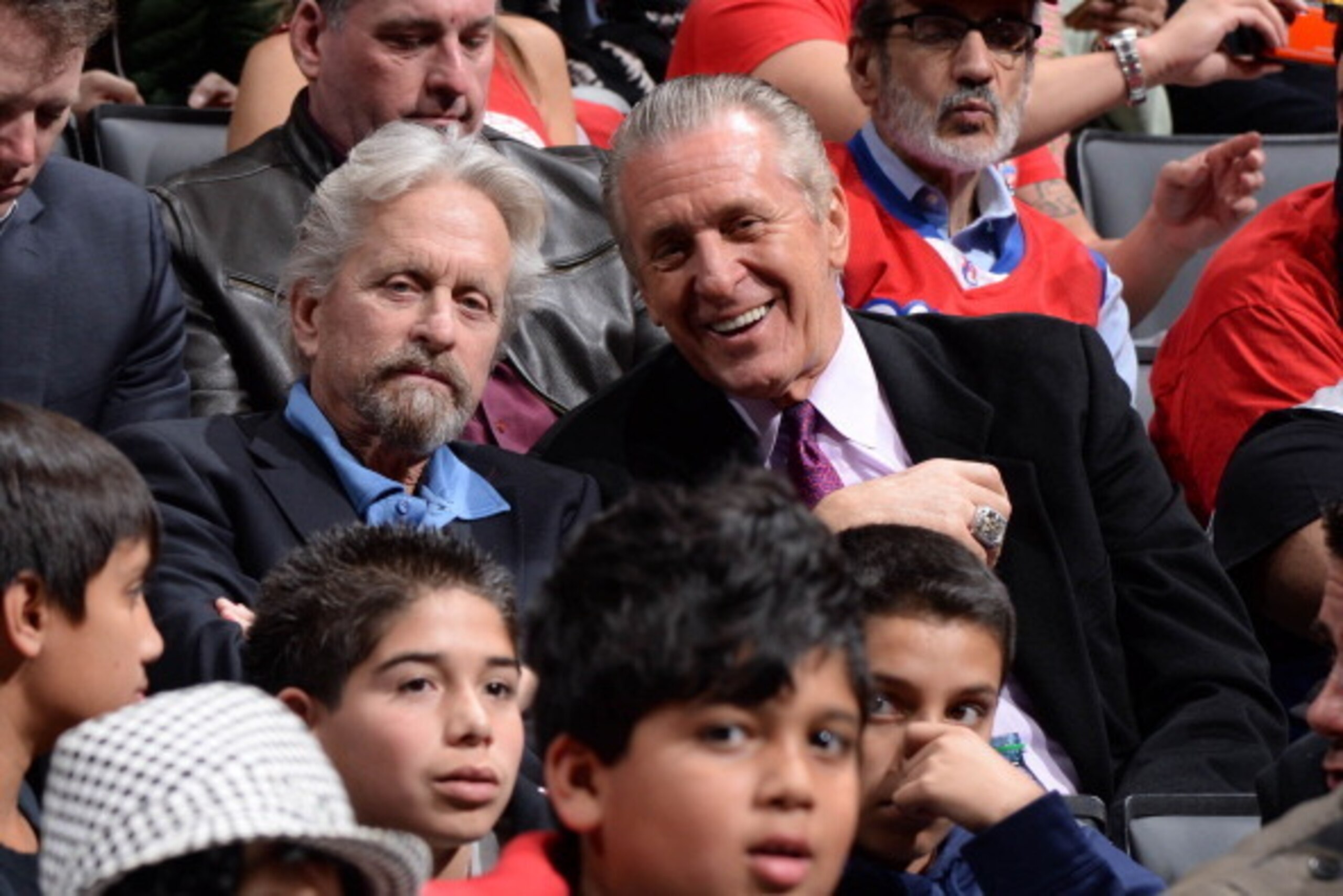 LOS ANGELES, CA - FEBRUARY 5: Actor Michael Douglas and Miami Heat executive Pat Riley pose for a photograph at a game between the Miami Heat against the Los Angeles Clippers at Staples Center on February 5, 2014 in Los Angeles, California. NOTE TO USER: 