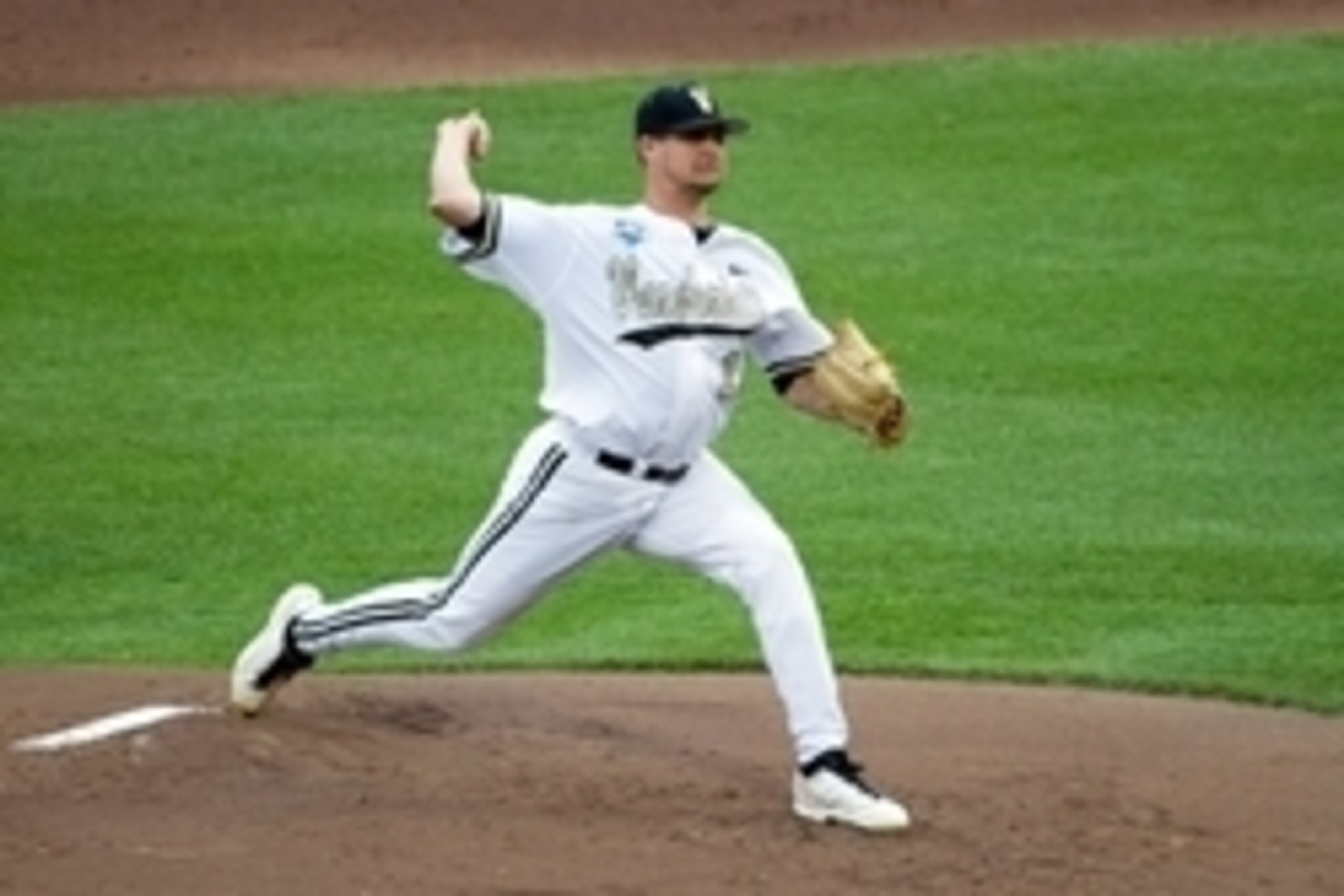 Jun 16, 2014; Omaha, NE, USA; Vanderbilt Commodores pitcher Tyler Beede (11) delivers a pitch against the UC Irvine Anteaters during game six of the 2014 College World Series at TD Ameritrade Park Omaha. Mandatory Credit: Steven Branscombe-USA TODAY Sport