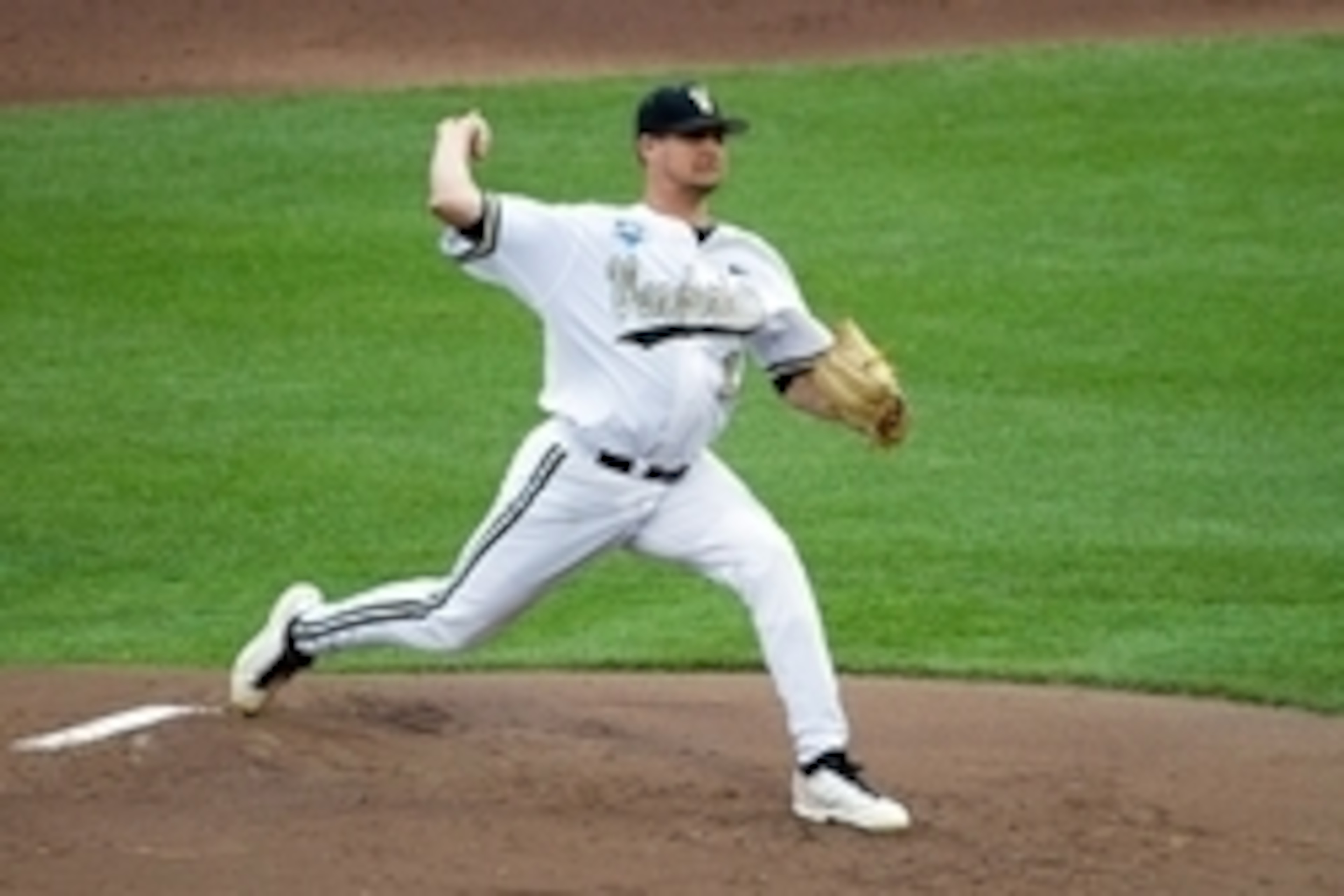 Jun 16, 2014; Omaha, NE, USA; Vanderbilt Commodores pitcher Tyler Beede (11) delivers a pitch against the UC Irvine Anteaters during game six of the 2014 College World Series at TD Ameritrade Park Omaha. Mandatory Credit: Steven Branscombe-USA TODAY Sport