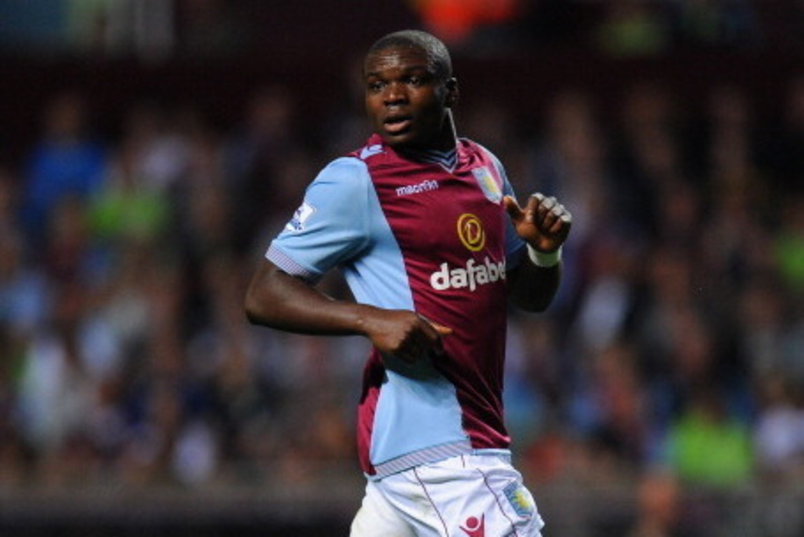 BIRMINGHAM, ENGLAND - AUGUST 28:  Aston Villa player Jores Okore in action during the Capital One Cup second round match between Aston Villa and Rotherham at Villa Park on August 28, 2013 in Birmingham, England.  (Photo by Stu Forster/Getty Images)