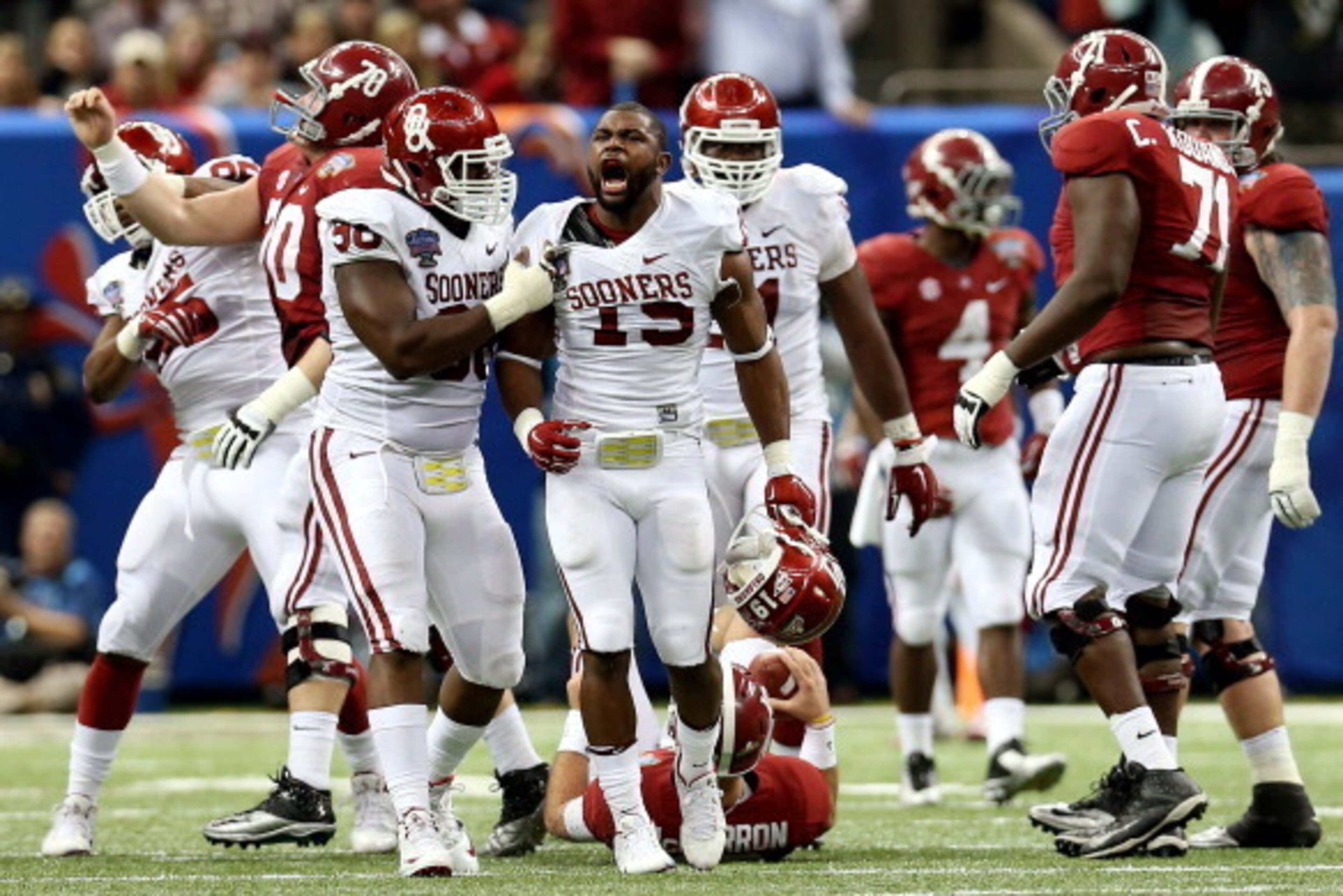 NEW ORLEANS, LA - JANUARY 02:  Eric Striker #19 of the Oklahoma Sooners celebrates after sacking AJ McCarron #10 of the Alabama Crimson Tide during the Allstate Sugar Bowl at the Mercedes-Benz Superdome on January 2, 2014 in New Orleans, Louisiana.  (Phot