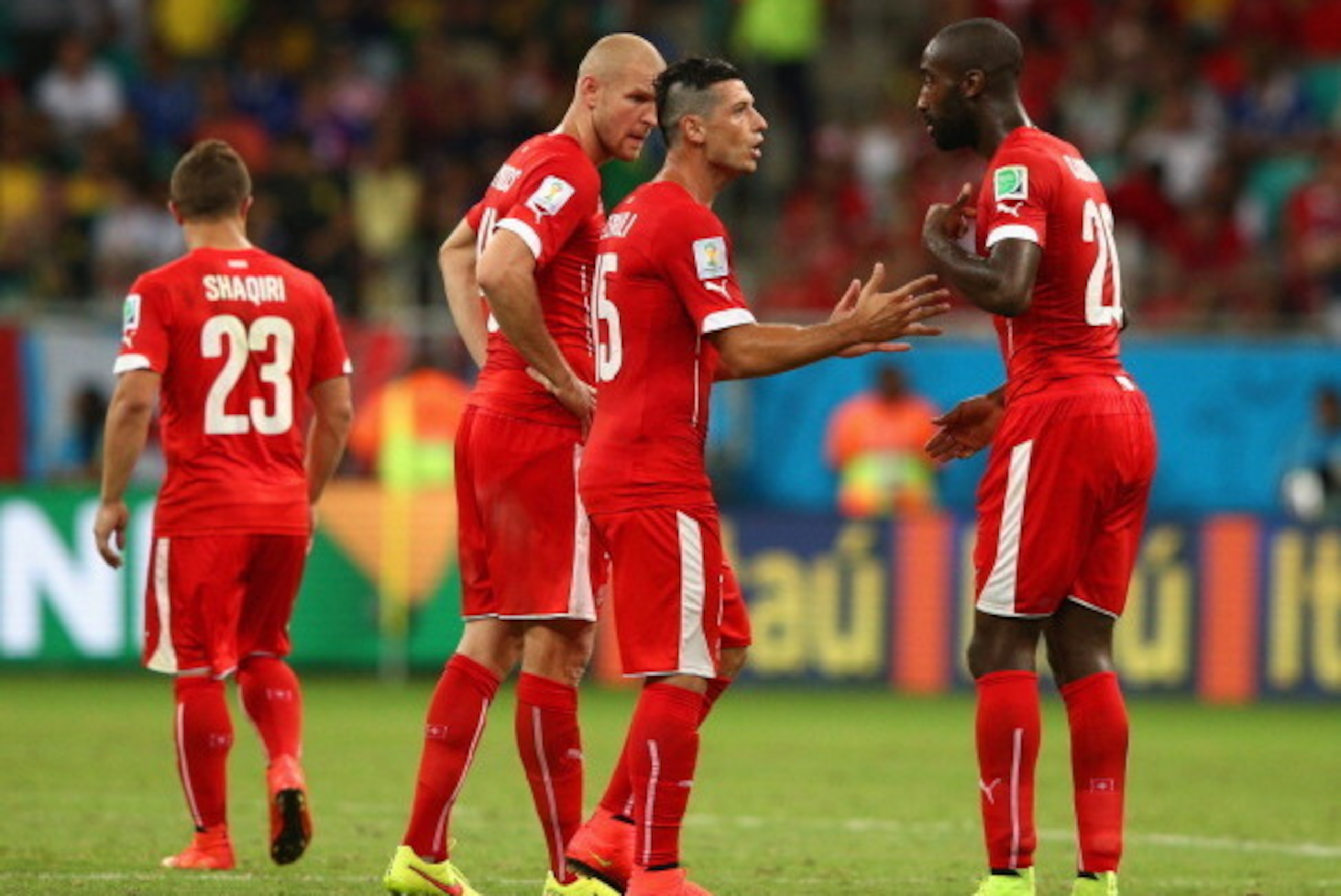 SALVADOR, BRAZIL - JUNE 20:  Blerim Dzemaili and Johan Djourou of Switzerland react during the 2014 FIFA World Cup Brazil Group E match between Switzerland and France at Arena Fonte Nova on June 20, 2014 in Salvador, Brazil.  (Photo by Adam Pretty/Getty I