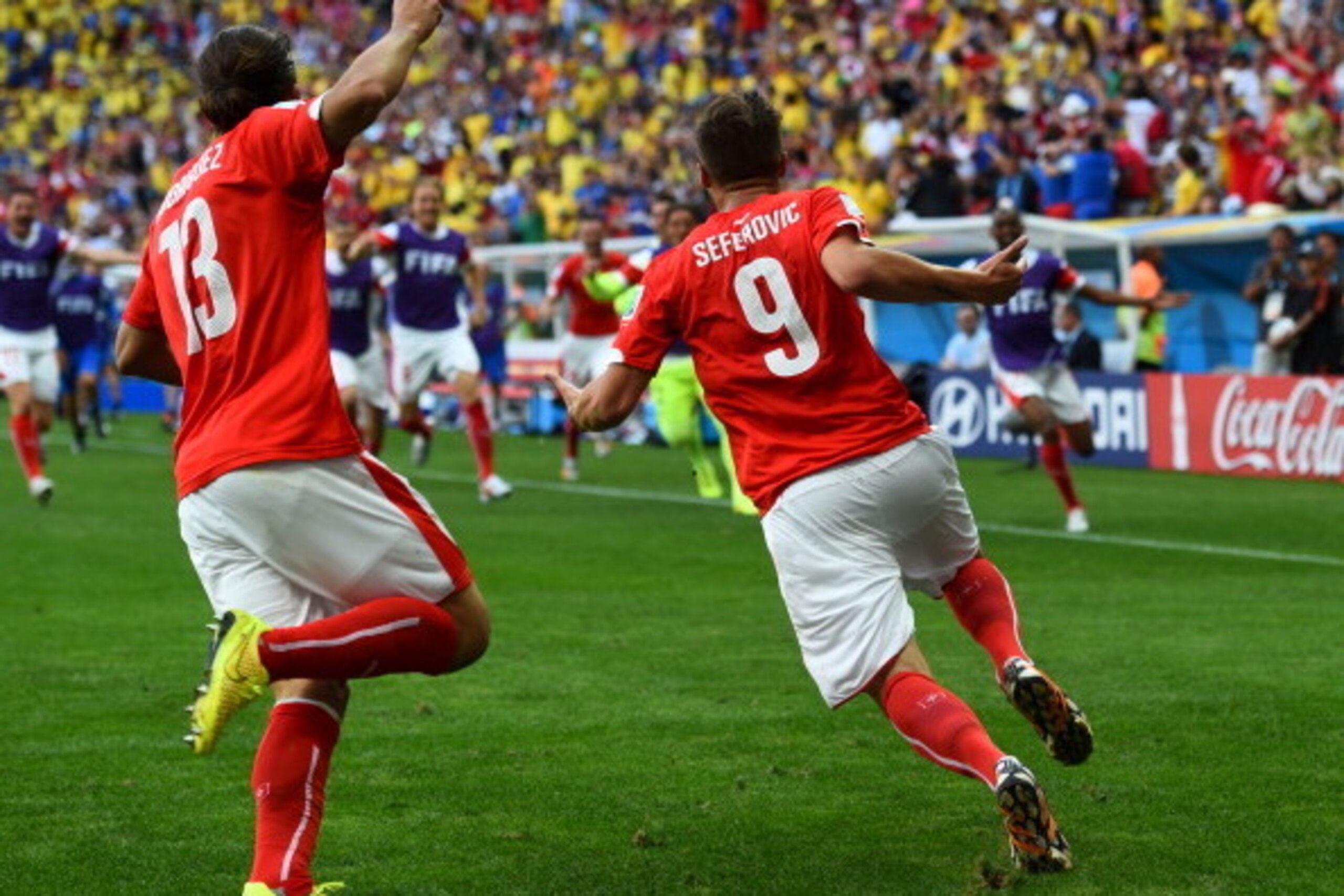 BRASILIA, BRAZIL - JUNE 15:  Haris Seferovic of Switzerland (R) and Ricardo Rodriguez celebrate after Switzerland's secund goal during the 2014 FIFA World Cup Brazil Group E match between Switzerland and Ecuador at Estadio Nacional on June 15, 2014 in Bra