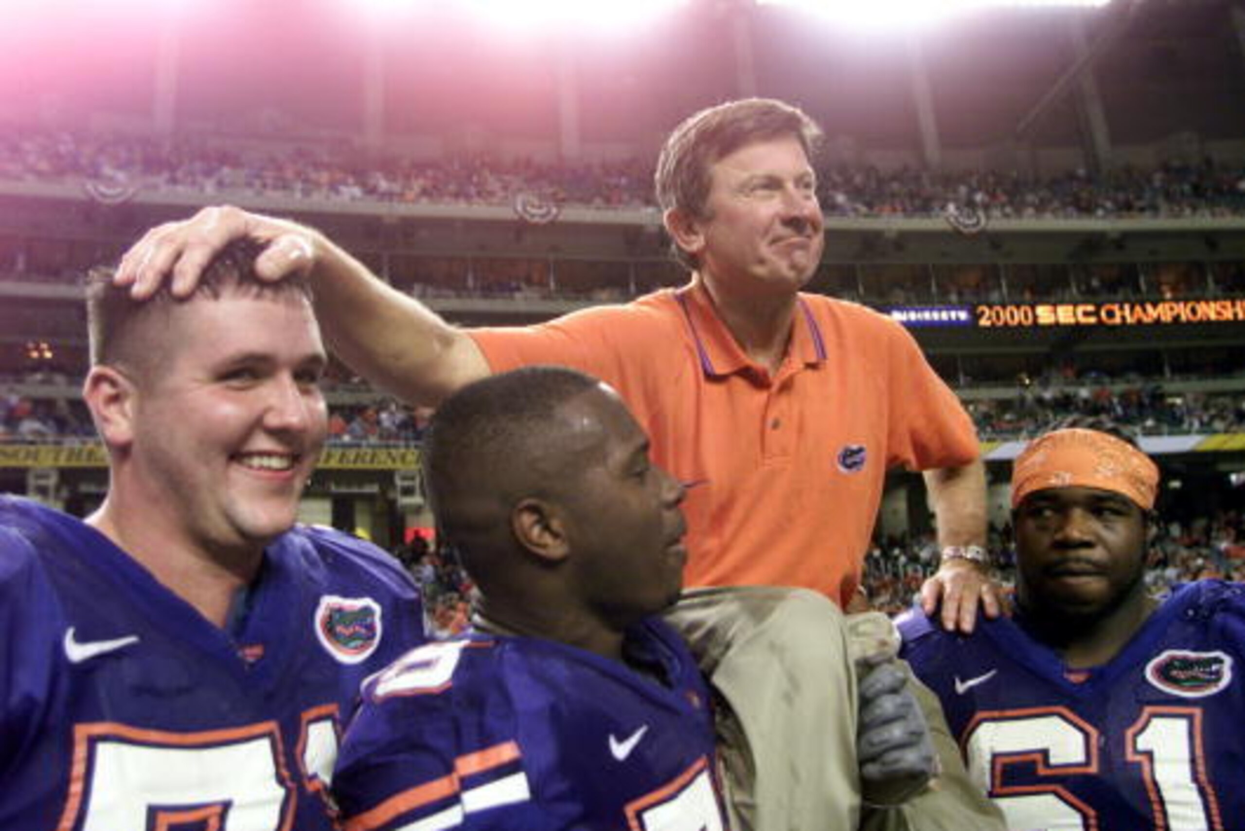2 Dec 2000:  Head coach Steve Spurrier of the Florida Gators is carried off the field by players following the Gators'' 28-6 victory over Auburn to win the Southeastern Conference (SEC) Championship at the Georgia Dome in Atlanta, Georgia.  DIGITAL IMAGE 