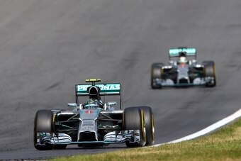 SPIELBERG, AUSTRIA - JUNE 22:  Nico Rosberg of Germany and Mercedes GP leads Lewis Hamilton of Great Britain and Mercedes GP during the Austrian Formula One Grand Prix at Red Bull Ring on June 22, 2014 in Spielberg, Austria.  (Photo by Mark Thompson/Getty