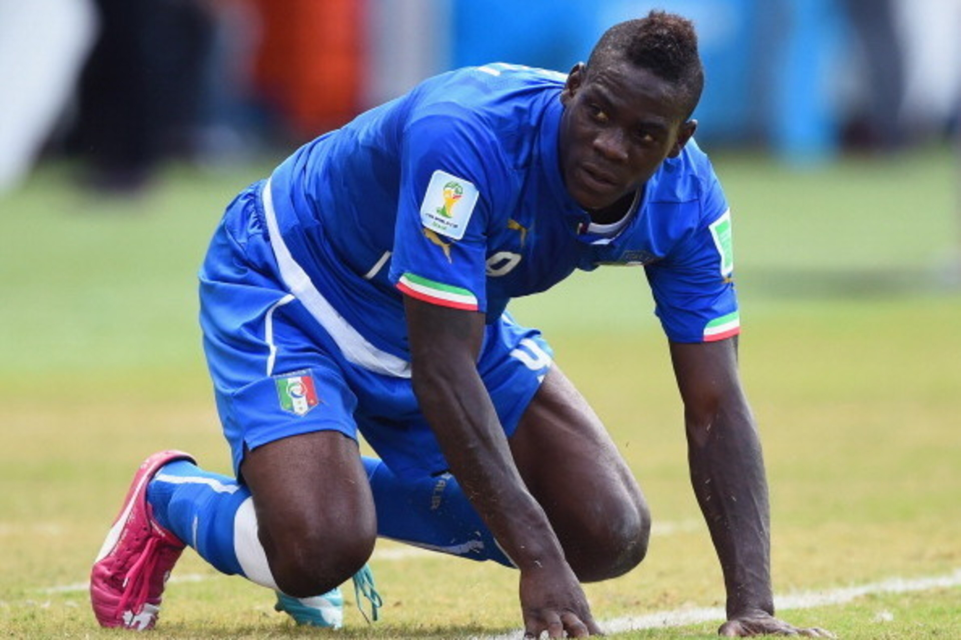 NATAL, BRAZIL - JUNE 24:  Mario Balotelli of Italy reacts during the 2014 FIFA World Cup Brazil Group D match between Italy and Uruguay at Estadio das Dunas on June 24, 2014 in Natal, Brazil.  (Photo by Matthias Hangst/Getty Images)