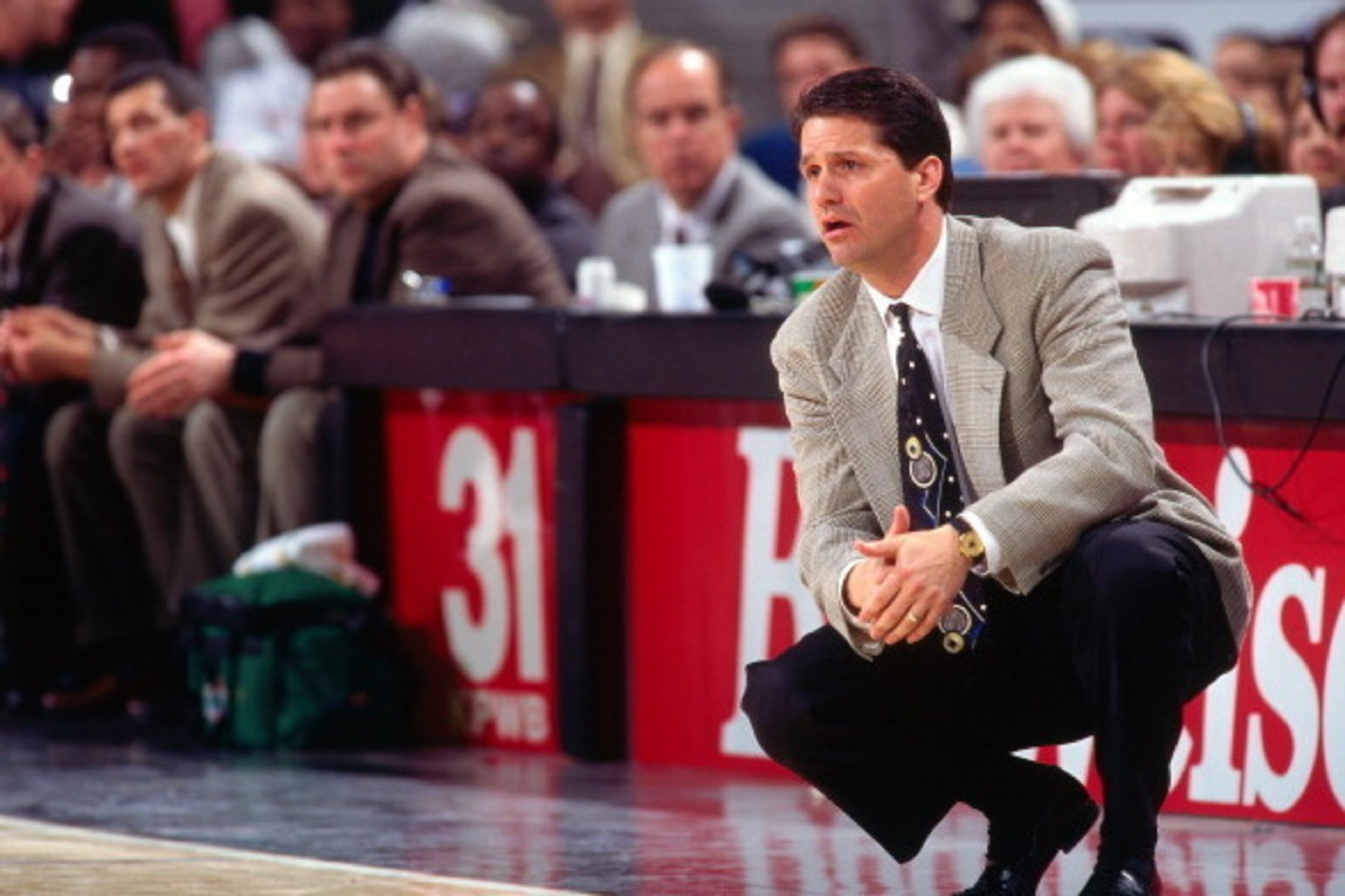 SACRAMENTO, CA - MARCH 3: New Jersey Nets head coach John Calipari looks on against the Sacramento Kings on March 3, 1997 at Arco Arena in Sacramento, California. NOTE TO USER: User expressly acknowledges and agrees that, by downloading and or using this 